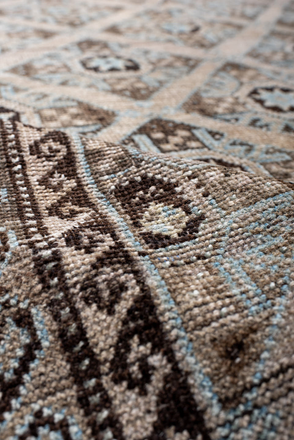 3' x 5' one-of-a-kind handmade antique Belouch small size rug. Color palette: brown, camel, ivory, sky blue, taupe, charcoal