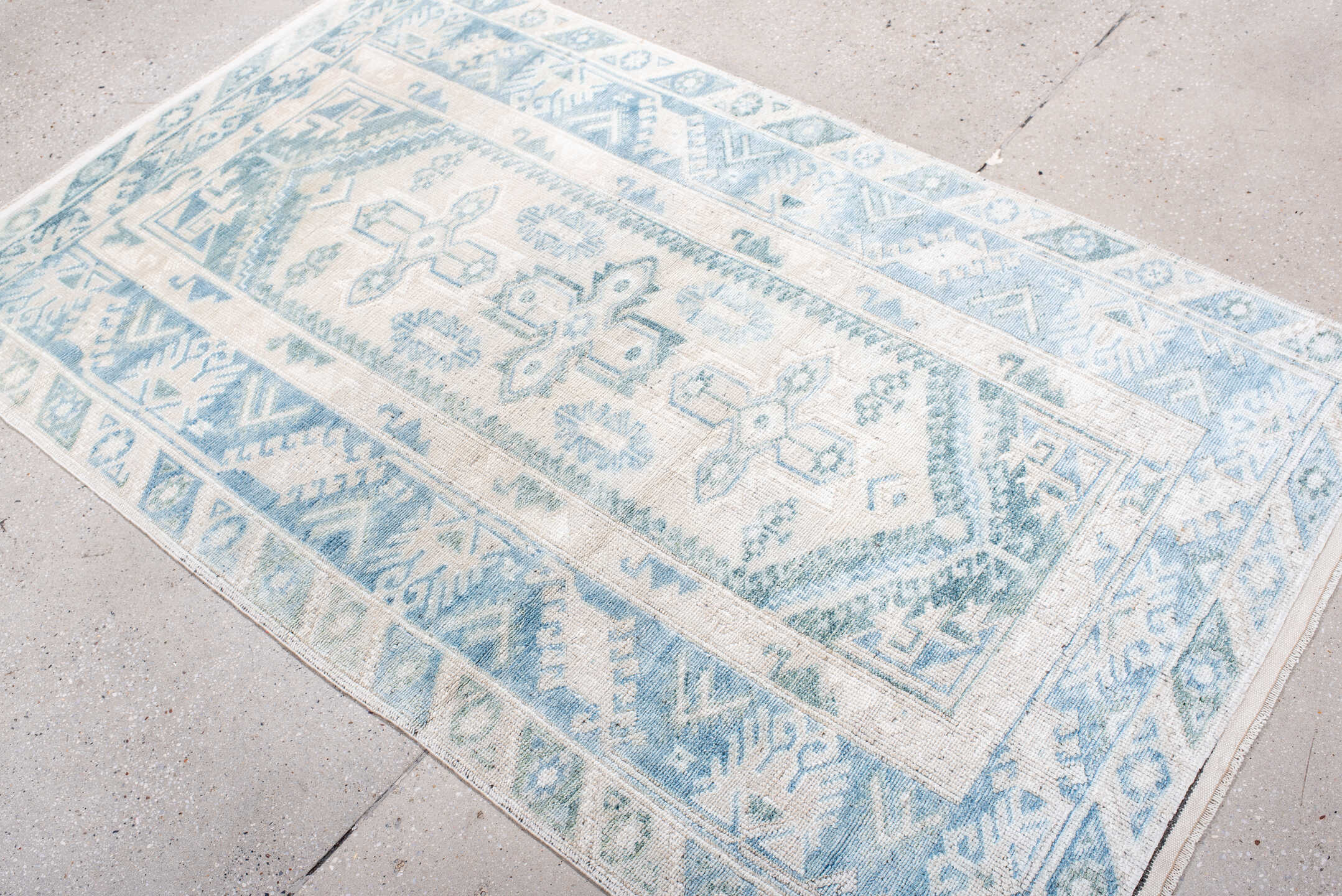 3' x 6' one-of-a-kind handmade antique Anatolian small size rug. Color palette: ivory, sky blue, pale blue, cream, aqua
