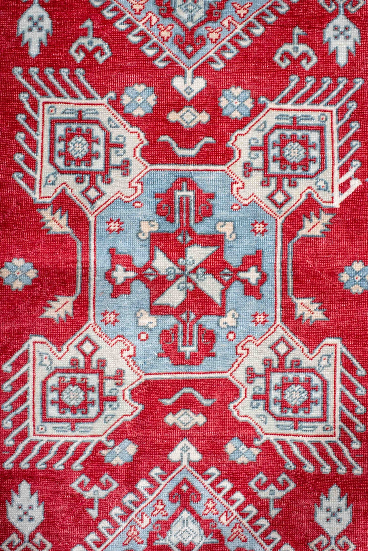 3' x 5' one-of-a-kind handmade antique Sivas small size rug. Color palette: red, ivory, pale blue, crimson, sky blue