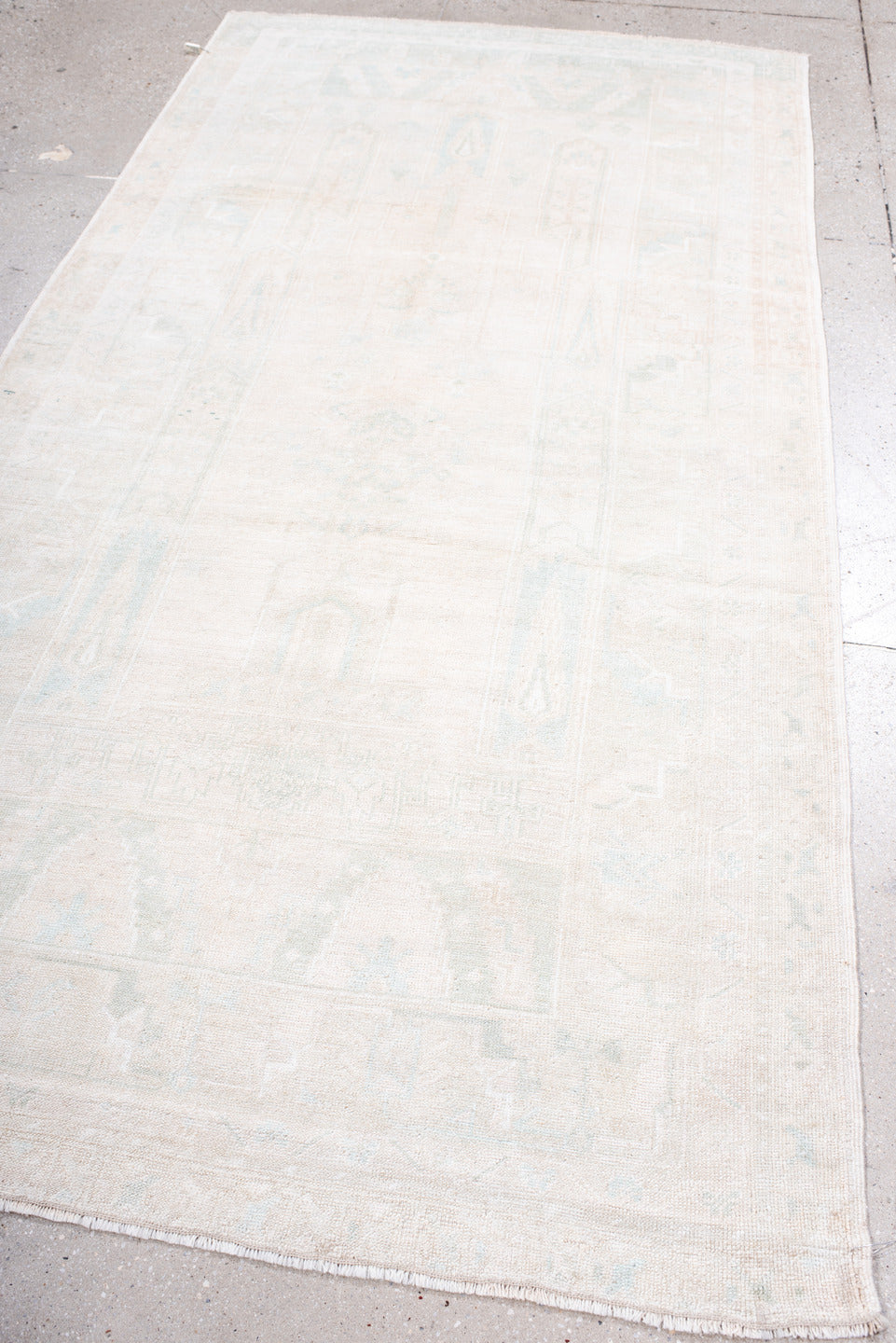 4' x 8' one-of-a-kind handmade antique Anatolian runner rug. Color palette: ivory, cream, pale blue, beige, taupe