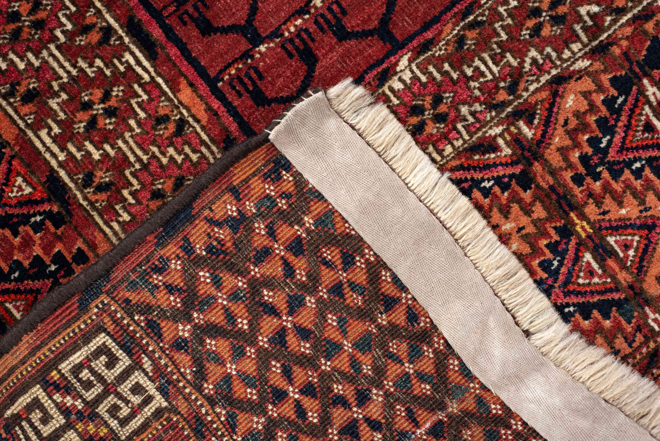 4' x 5' one-of-a-kind handmade antique Torkaman small size rug. Color palette: rust, crimson, ivory, black, terra cotta