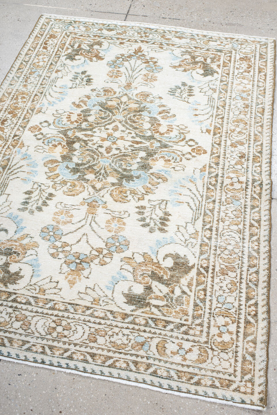 3' x 5' one-of-a-kind handmade antique Lilian small size rug. Color palette: ivory, taupe, camel, pale_blue, brown, sage