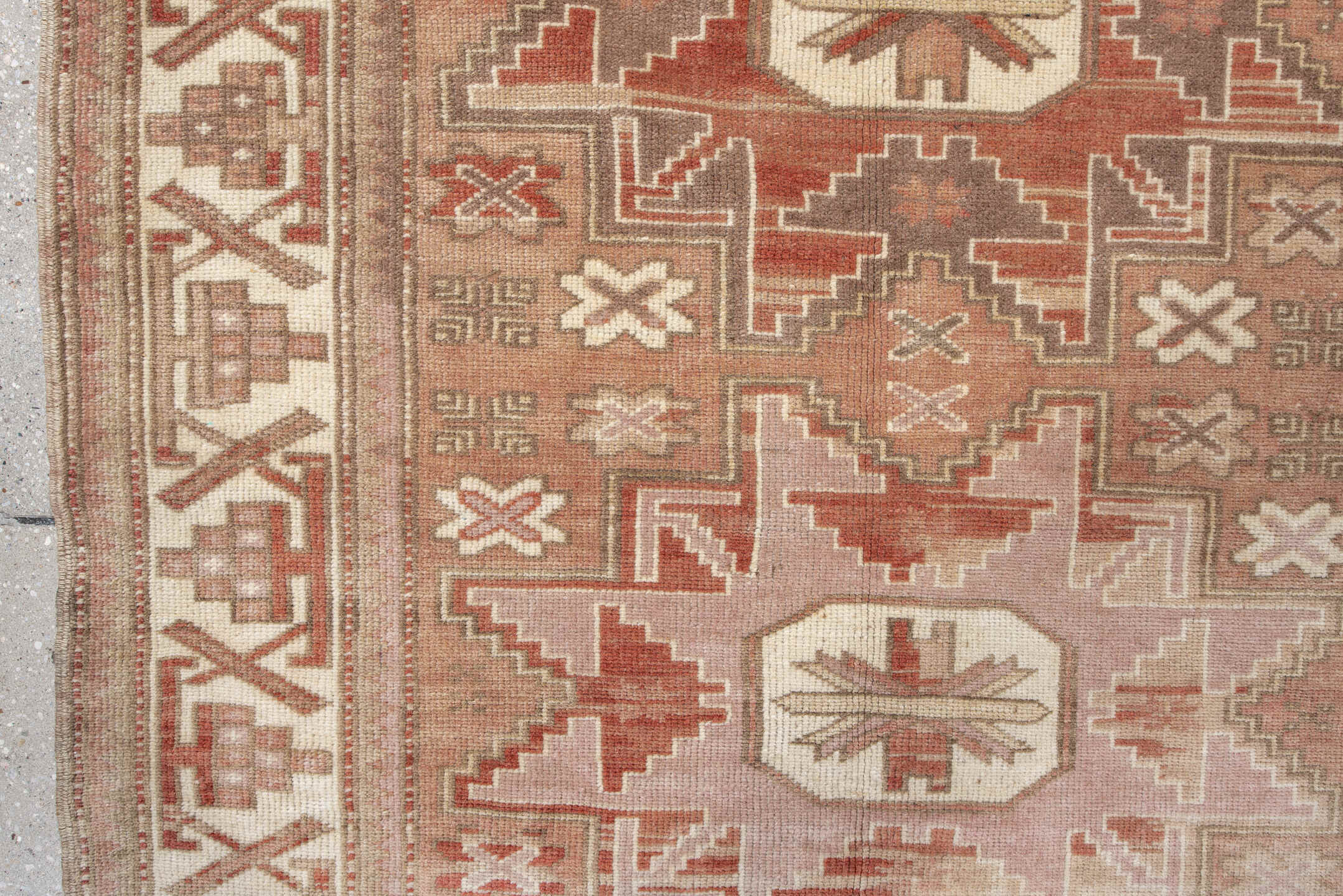 3' x 6' one-of-a-kind handmade vintage Anatolian small size rug. Color palette: brown, light gray, off-white, orange, pink