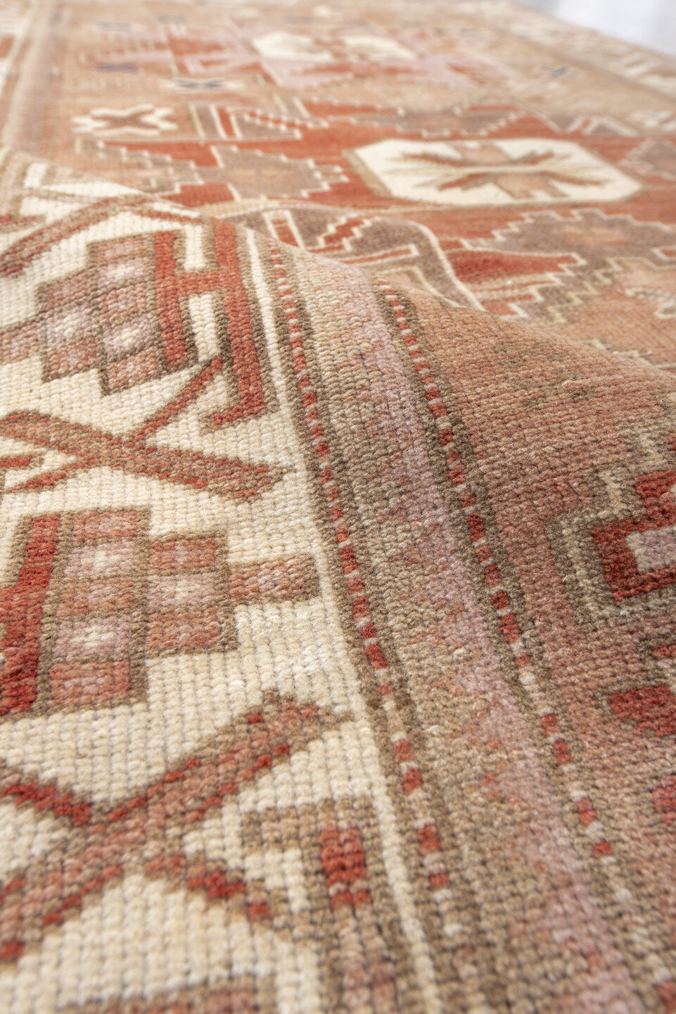 3' x 6' one-of-a-kind handmade vintage Anatolian small size rug. Color palette: brown, light gray, off-white, orange, pink