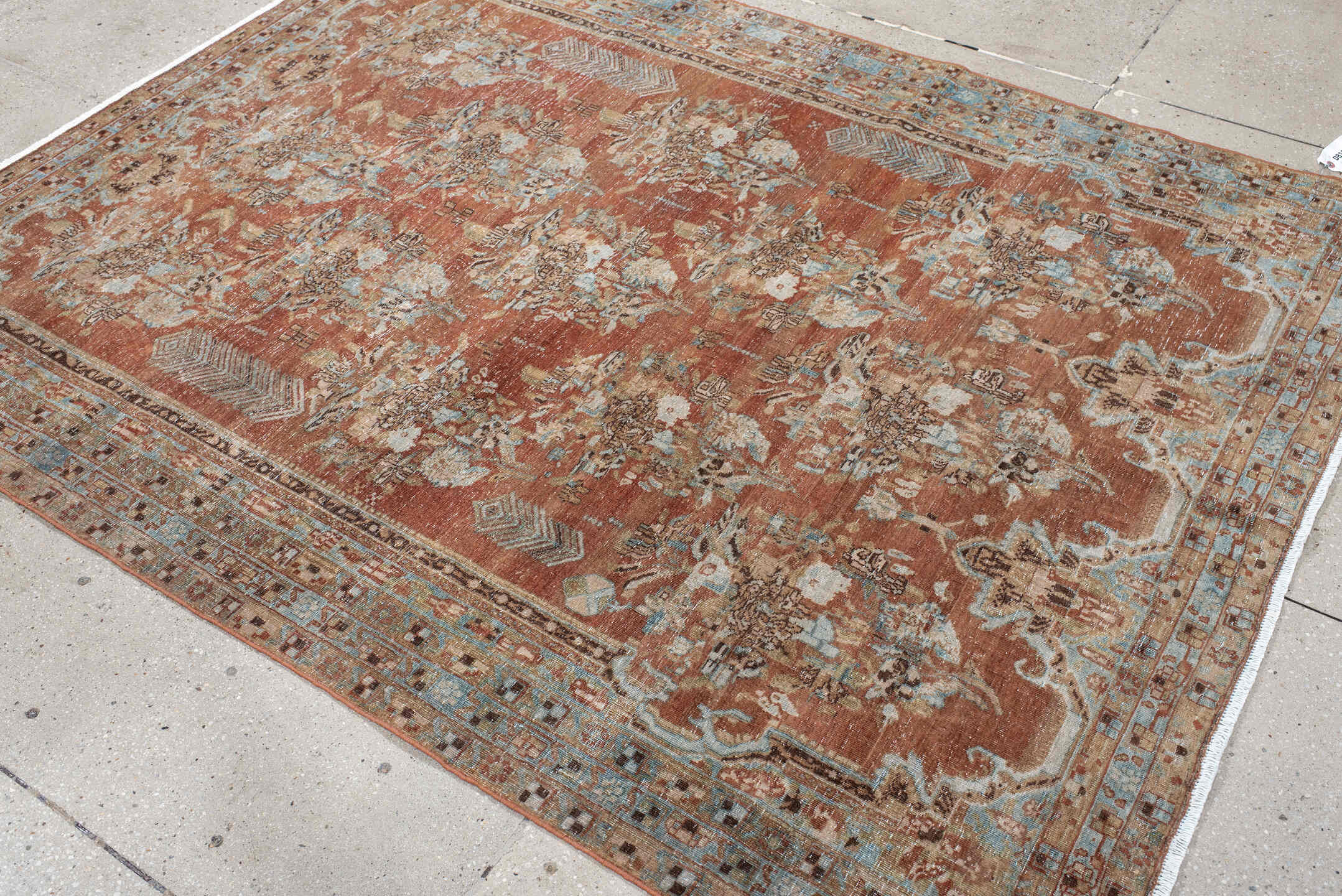 5' x 6' one-of-a-kind handmade vintage Afshar rug. Color palette: terra cotta, sky blue, ivory, taupe, brown, charcoal