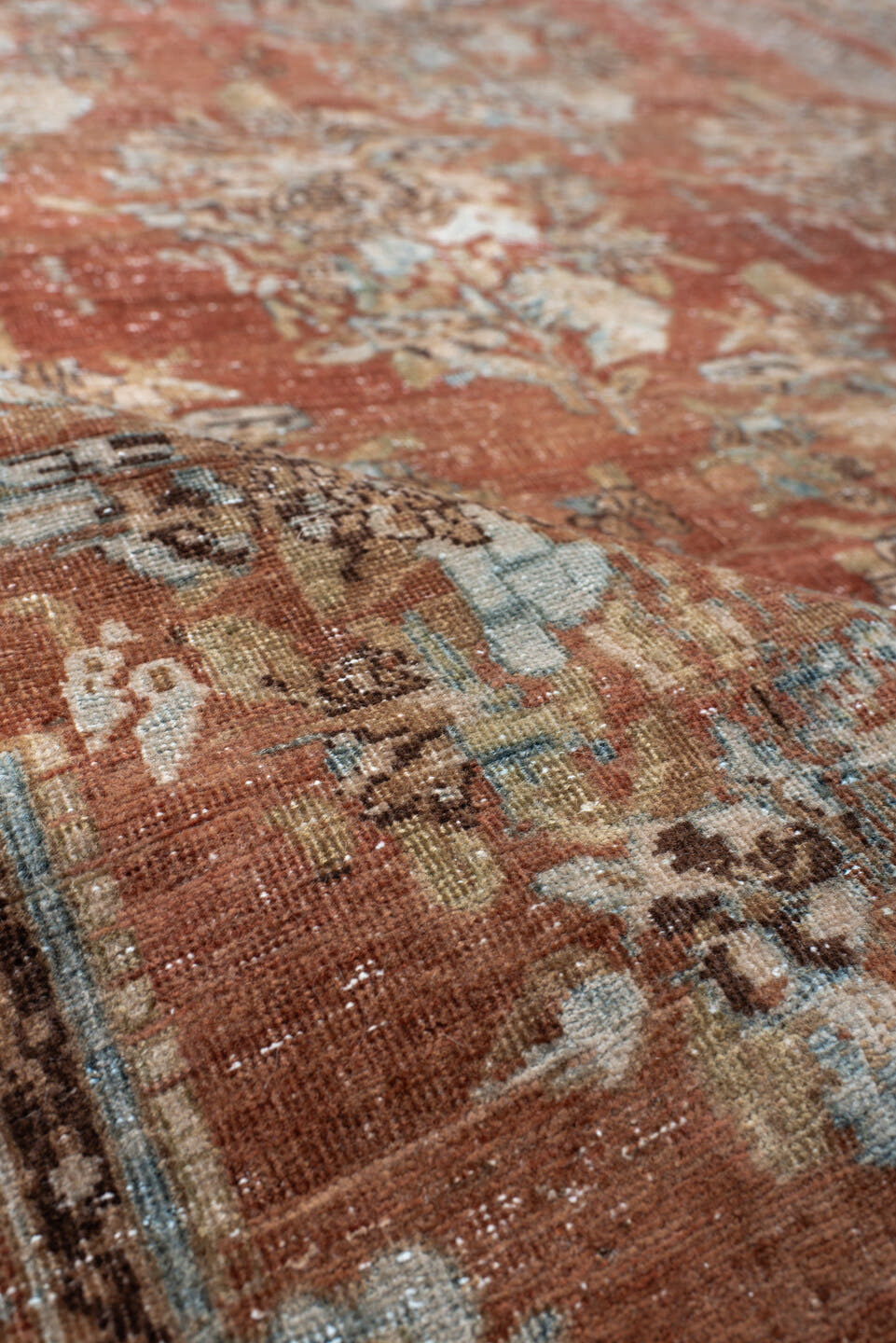 5' x 6' one-of-a-kind handmade vintage Afshar rug. Color palette: terra cotta, sky blue, ivory, taupe, brown, charcoal