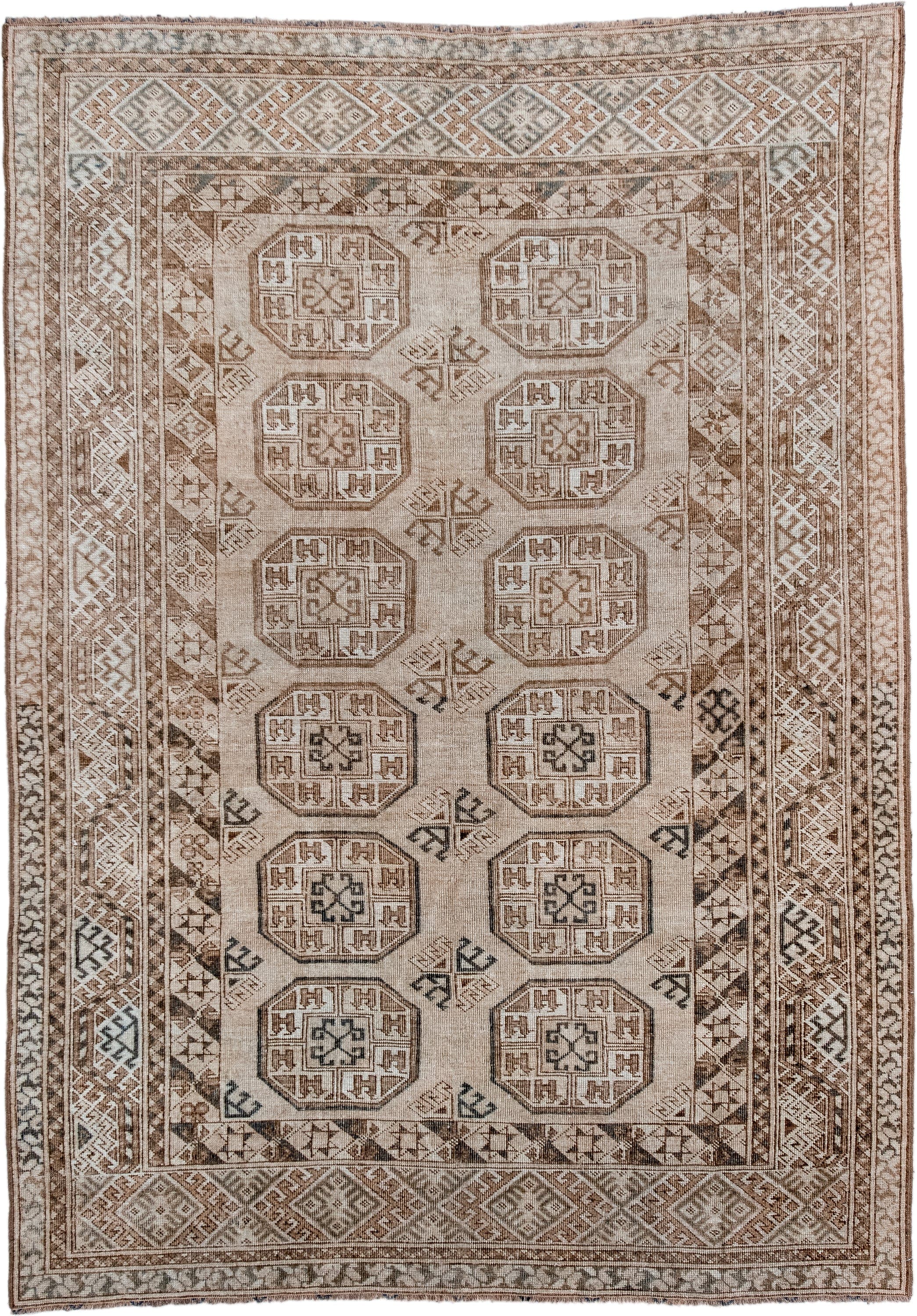 5' x 7' one-of-a-kind handmade antique Afghan rug. Color palette: ivory, taupe, camel, brown, charcoal, beige, gray, black