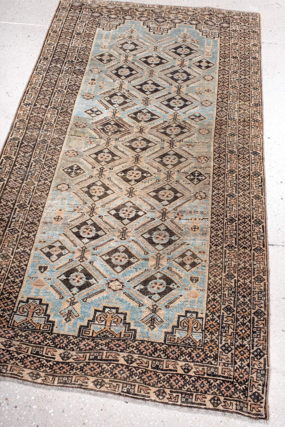 3' x 5' one-of-a-kind handmade antique Belouch small size rug. Color palette: sky blue, ivory, charcoal, taupe, camel, brown
