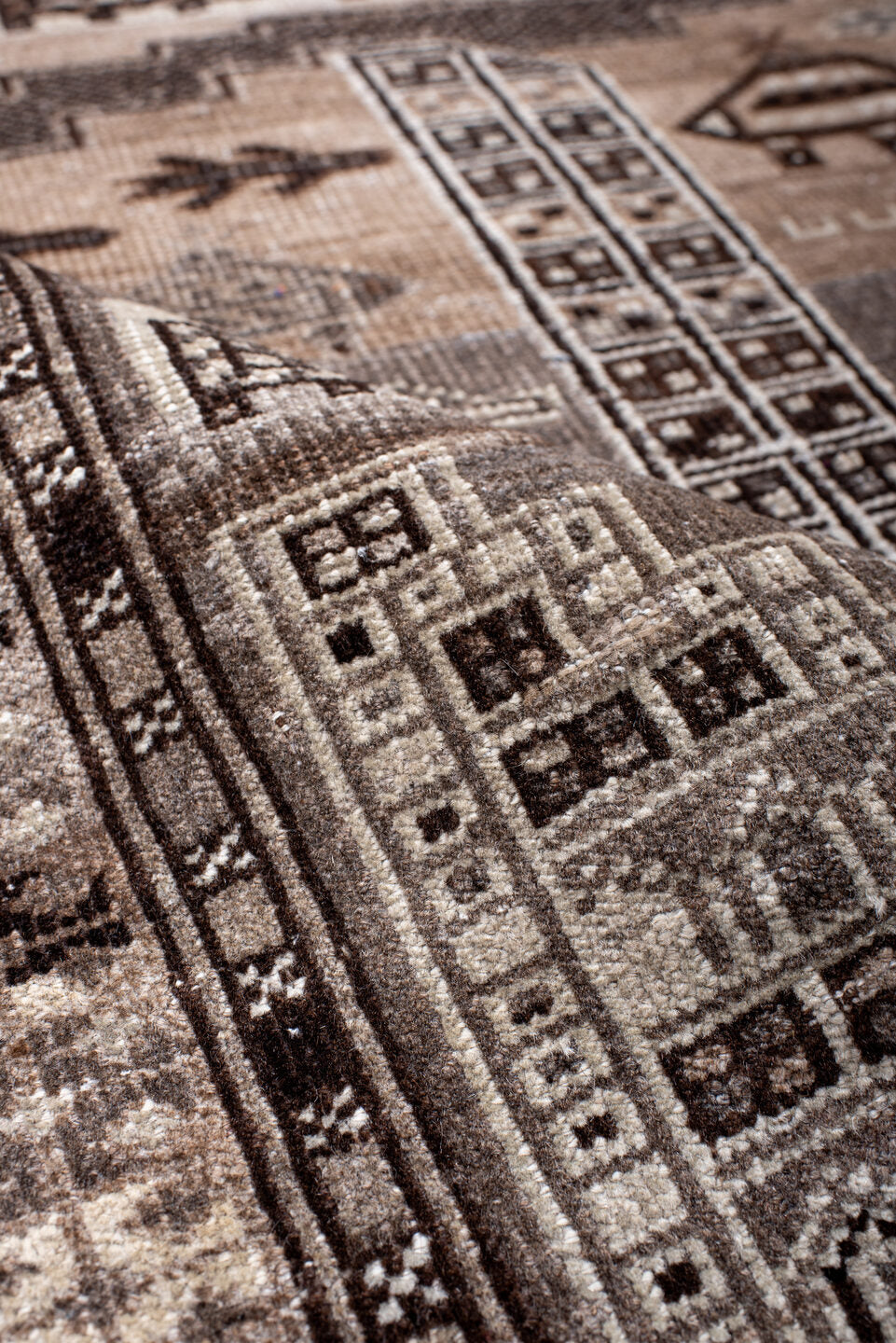 2' x 4' one-of-a-kind handmade vintage Belouch small size rug. Color palette: black, brown, charcoal, gray, light gray