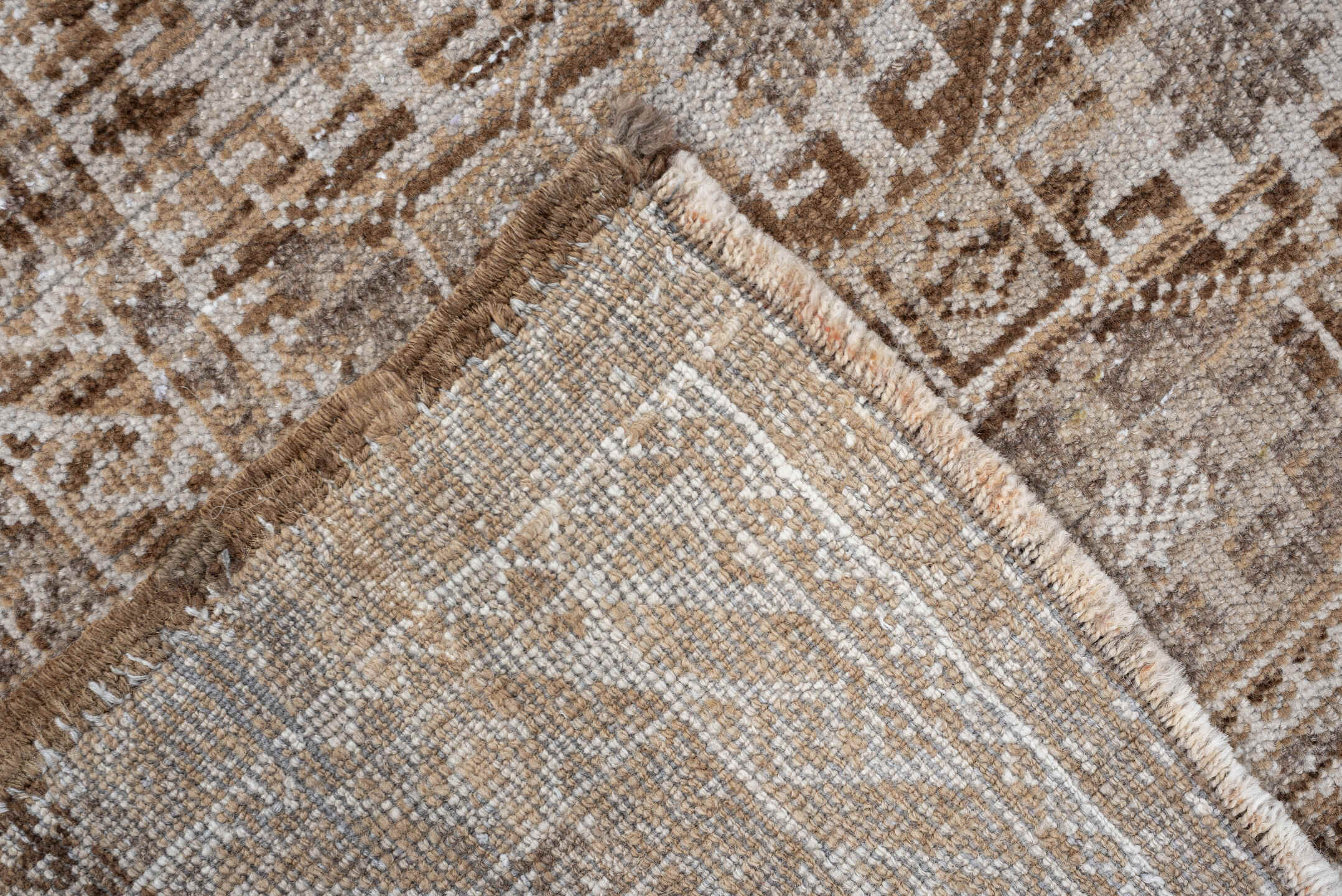 6' x 3' one-of-a-kind handmade antique Belouch rug. Color palette: camel, ivory, taupe, brown, sand, beige, gray