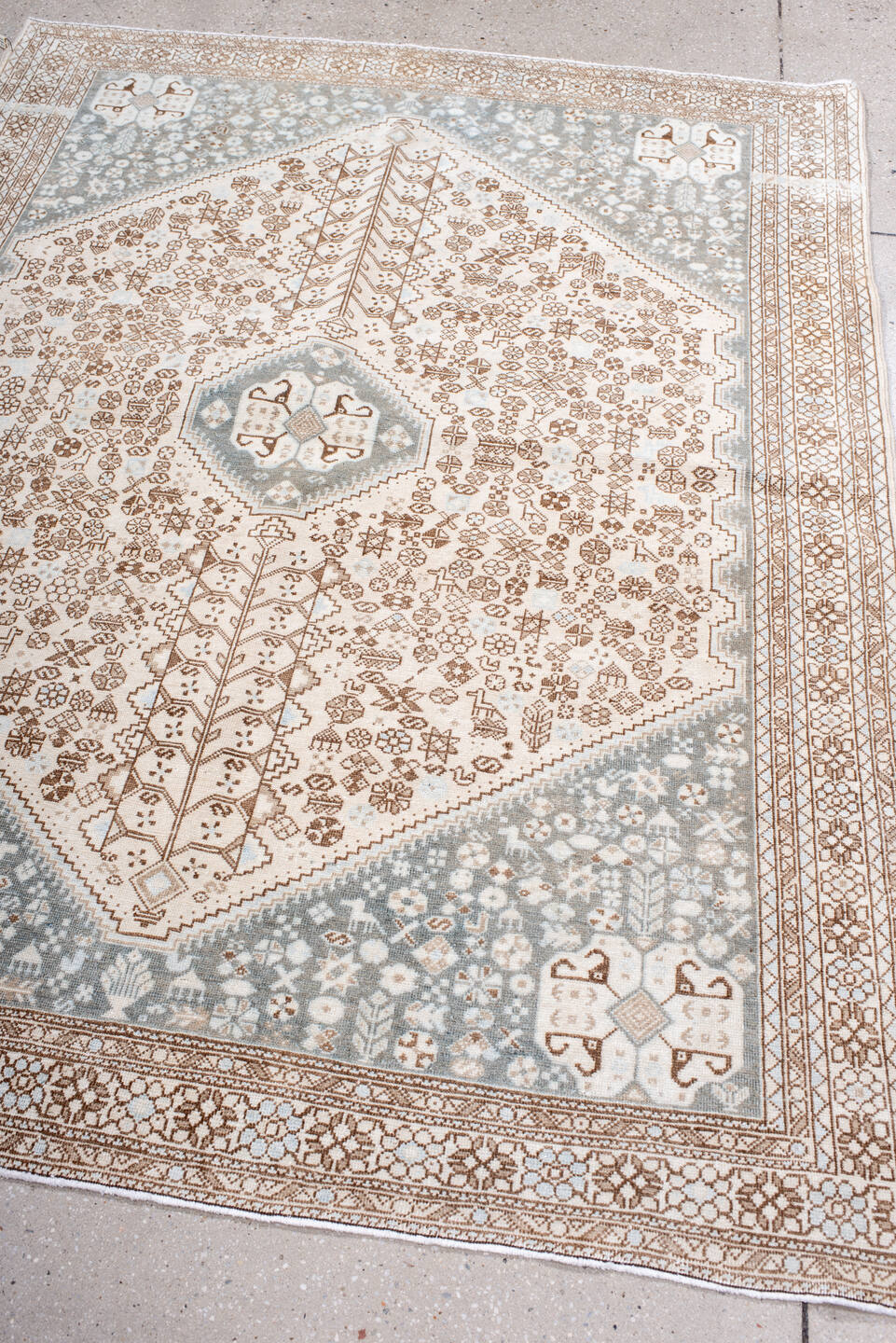 4' x 6' one-of-a-kind handmade antique Joshegan small size rug. Color palette: ivory, taupe, pale blue, camel, light gray