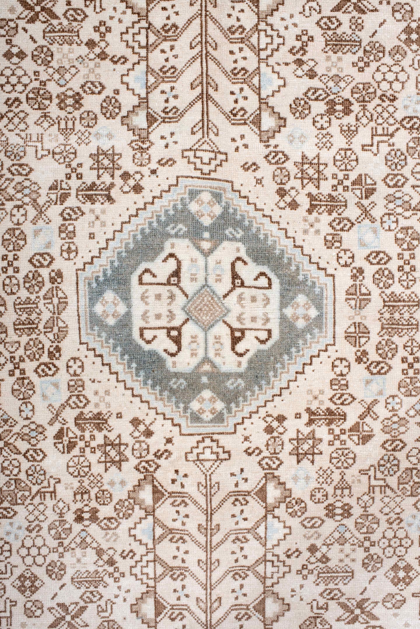 4' x 6' one-of-a-kind handmade antique Joshegan small size rug. Color palette: ivory, taupe, pale blue, camel, light gray