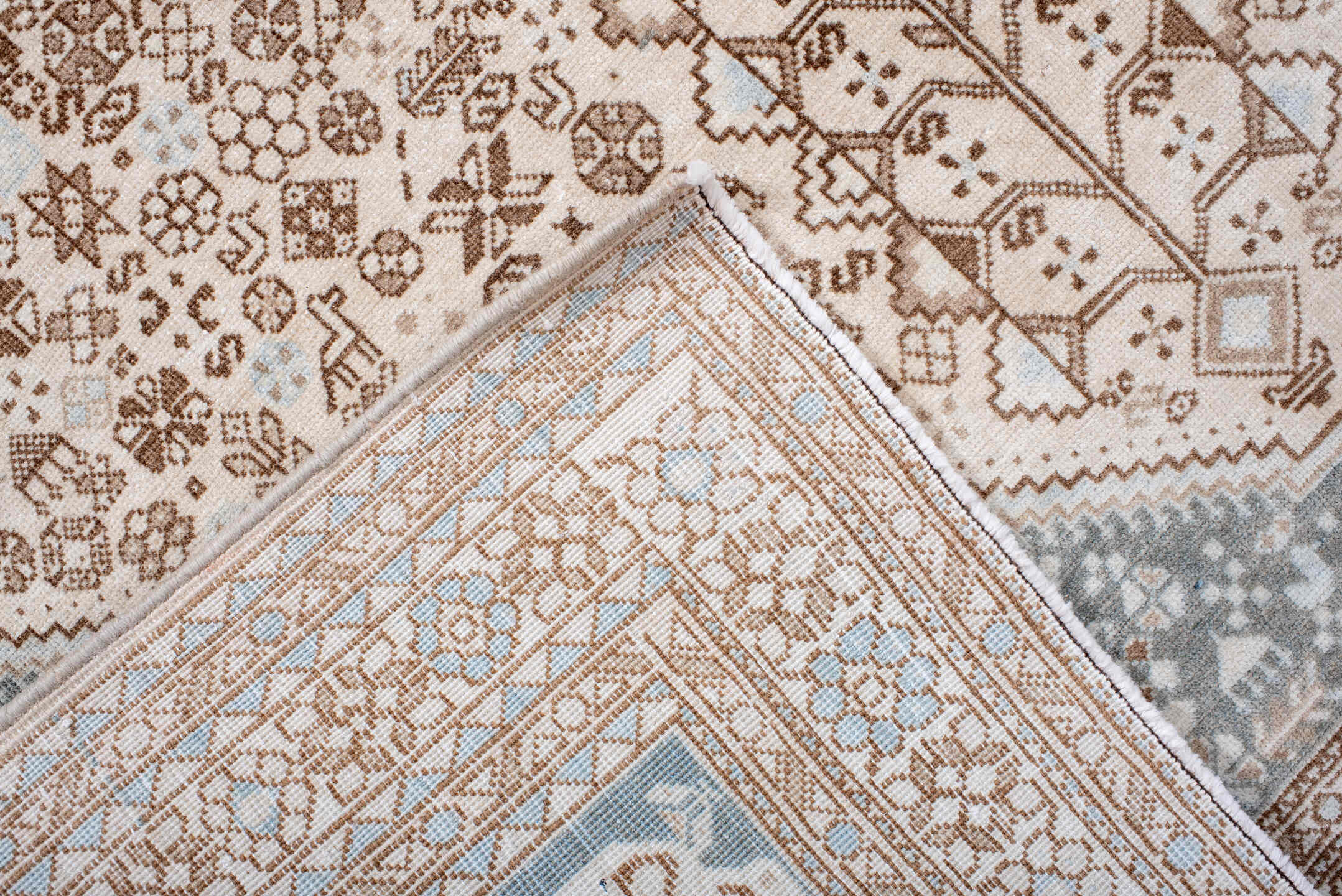 4' x 6' one-of-a-kind handmade antique Joshegan small size rug. Color palette: ivory, taupe, pale blue, camel, light gray