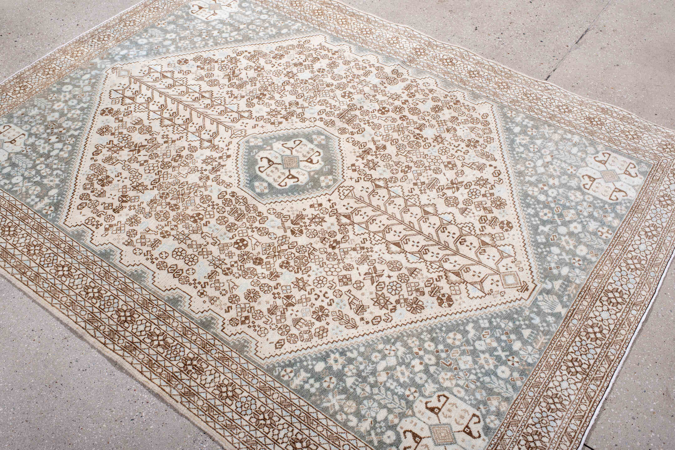 4' x 6' one-of-a-kind handmade antique Joshegan small size rug. Color palette: ivory, taupe, pale blue, camel, light gray