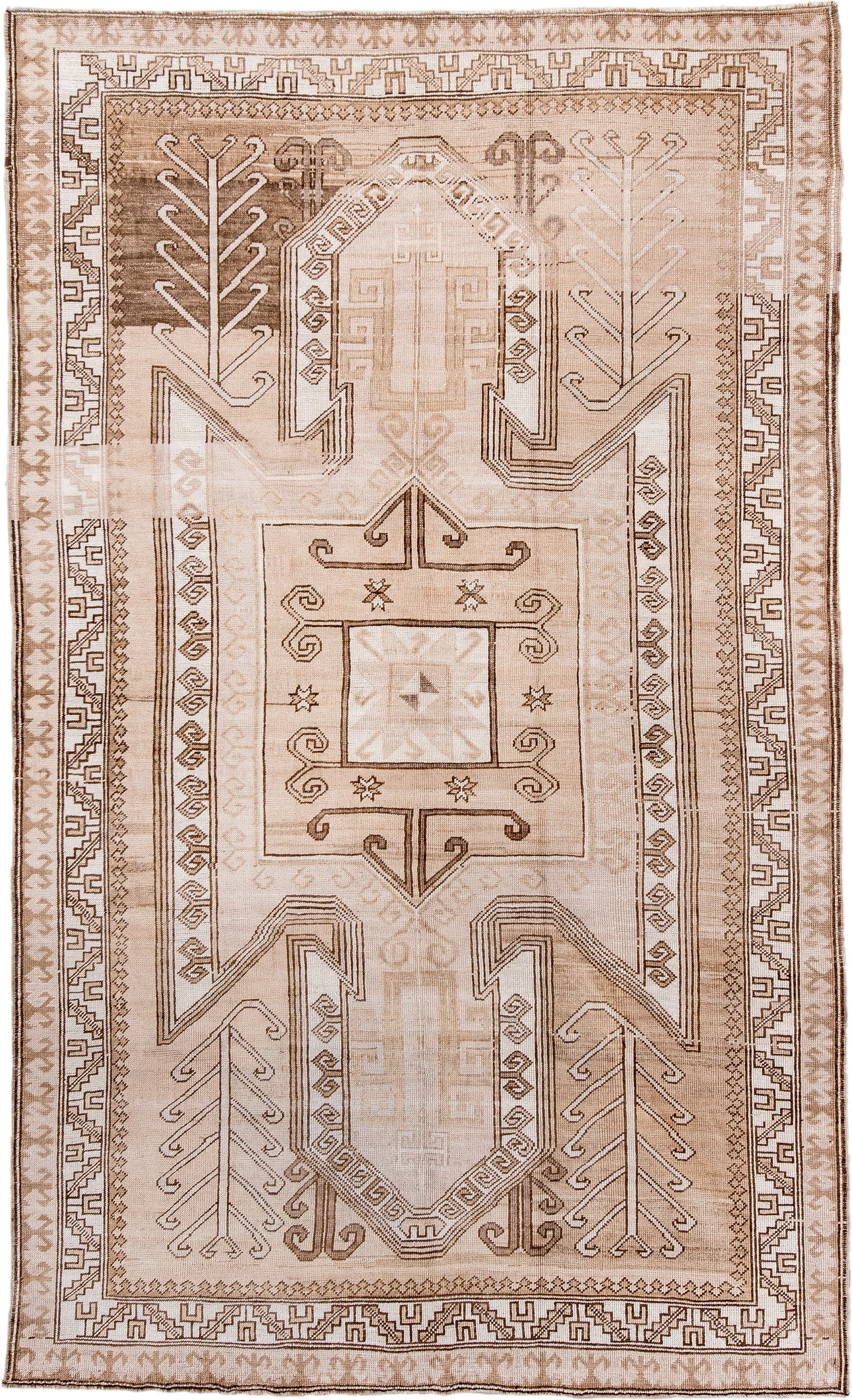 6' x 10' one-of-a-kind handmade antique Kars large size rug. Color palette: ivory, beige, taupe, camel, brown, blush, gray