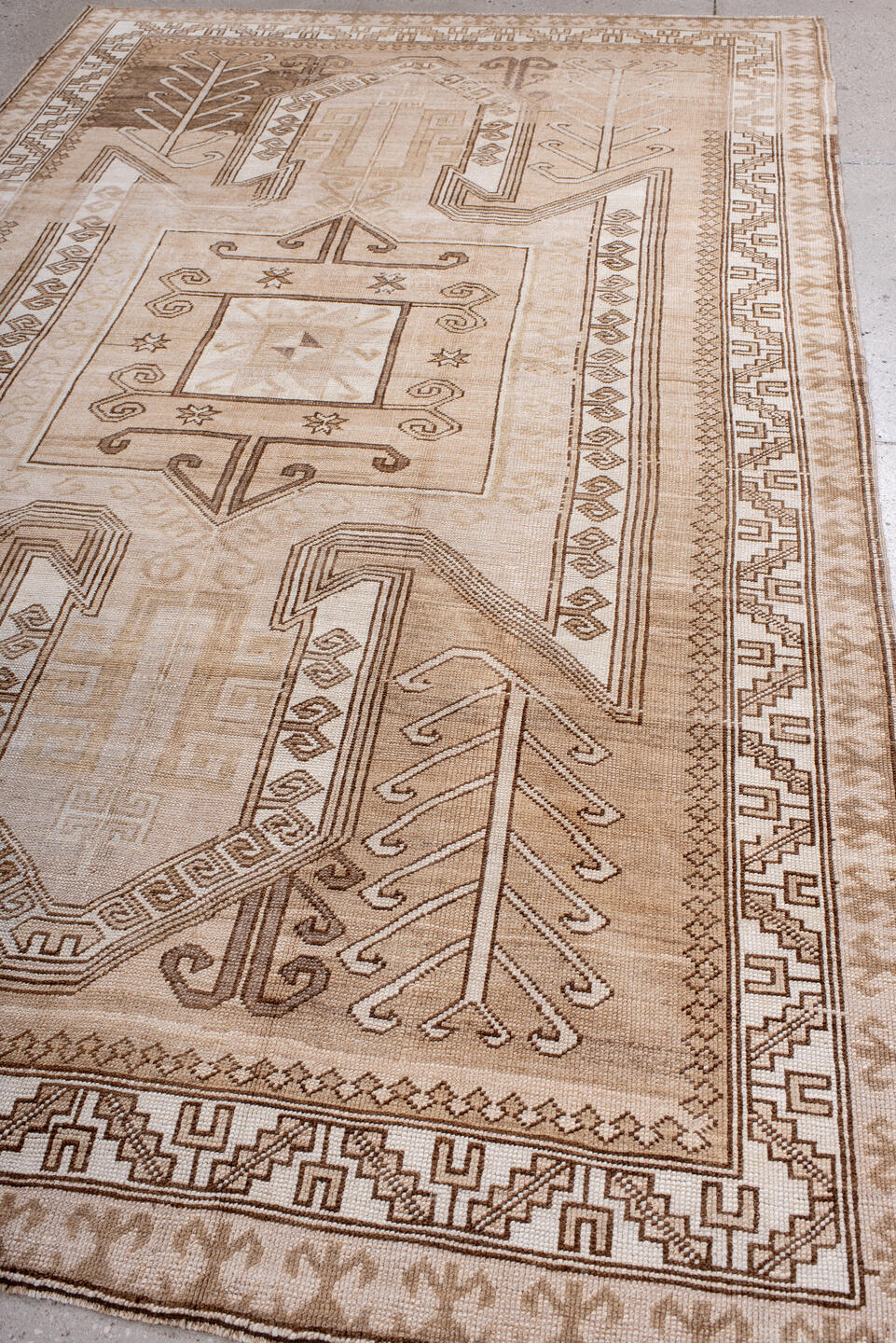 6' x 10' one-of-a-kind handmade antique Kars large size rug. Color palette: ivory, beige, taupe, camel, brown, blush, gray