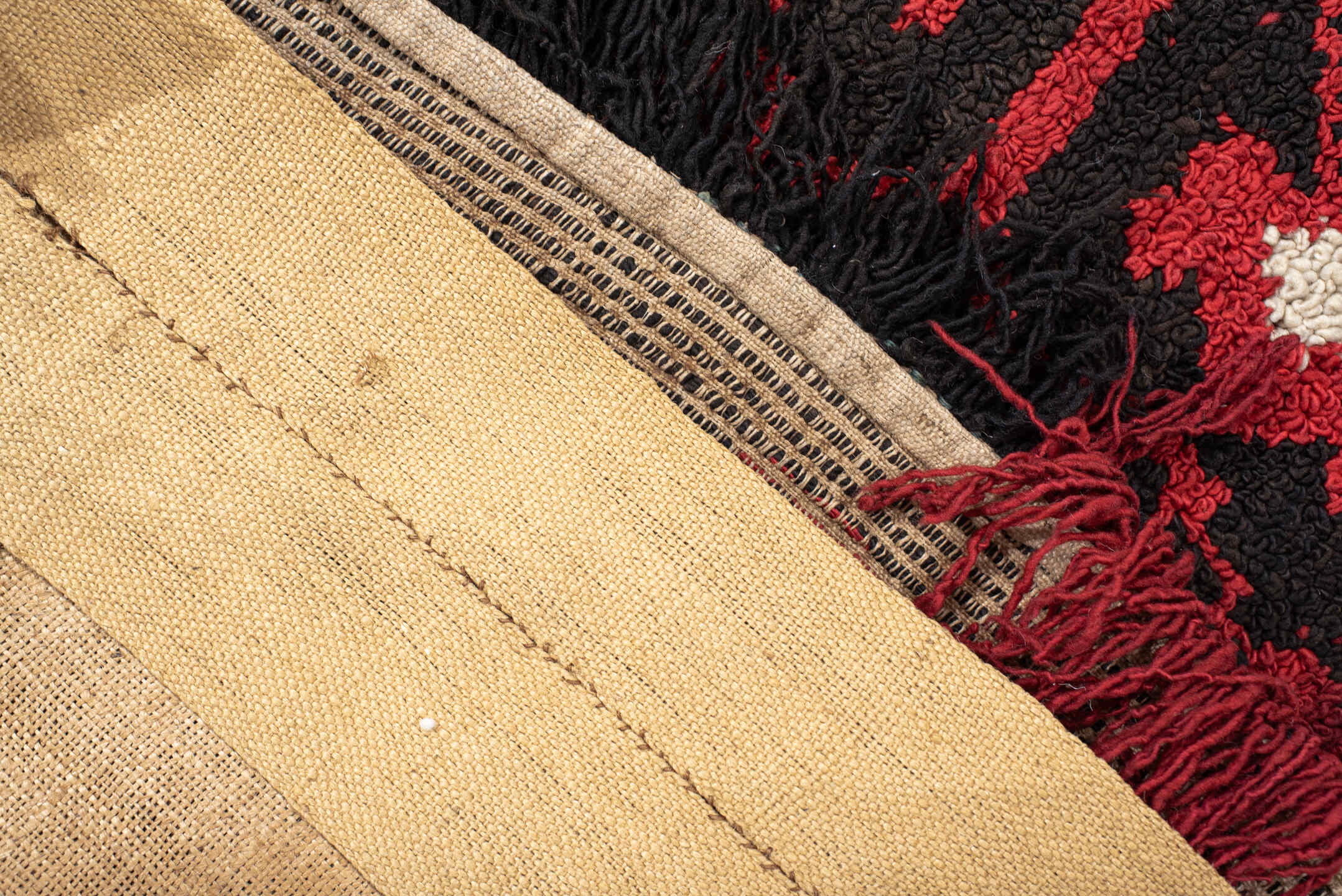 5' x 7' one-of-a-kind handmade vintage European rug. Color palette: off-white, pink, gray, blue, red, brown, black, charcoal