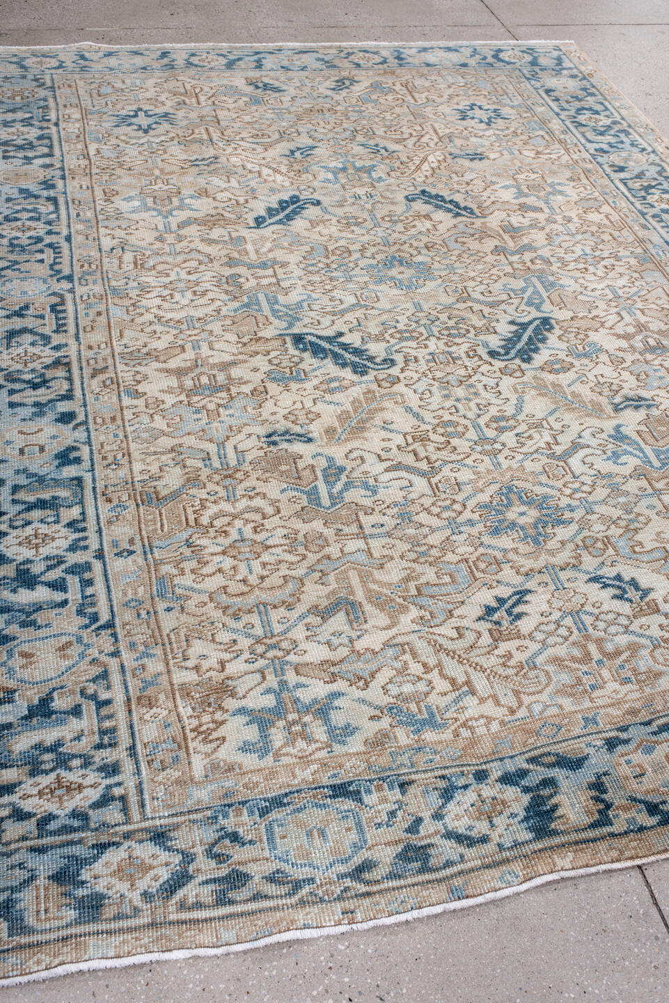 6' x 9' one-of-a-kind handmade antique Heriz rug. Color palette: ivory, sky blue, beige, navy, taupe, light blue, blue, gray