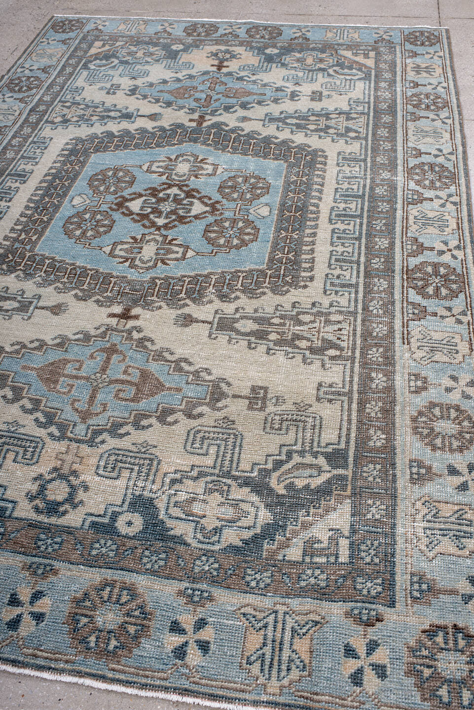 6' x 9' one-of-a-kind handmade antique Veece medium size rug. Color palette: ivory, sky blue, slate, taupe, brown, charcoal