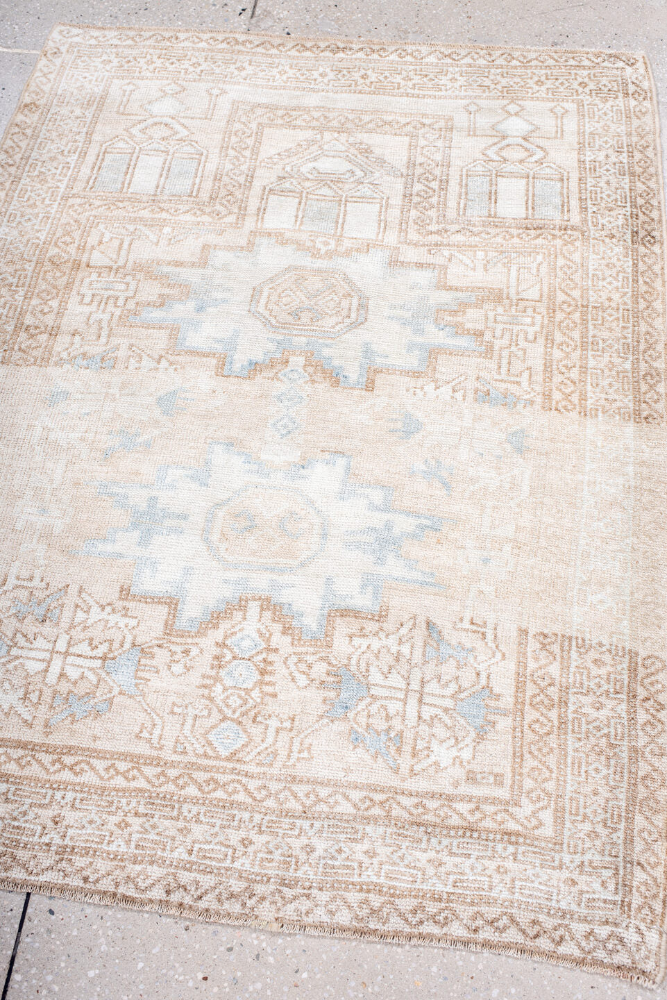 3' x 4' one-of-a-kind handmade antique Belouch small size rug. Color palette: ivory, camel, pale blue, beige, taupe