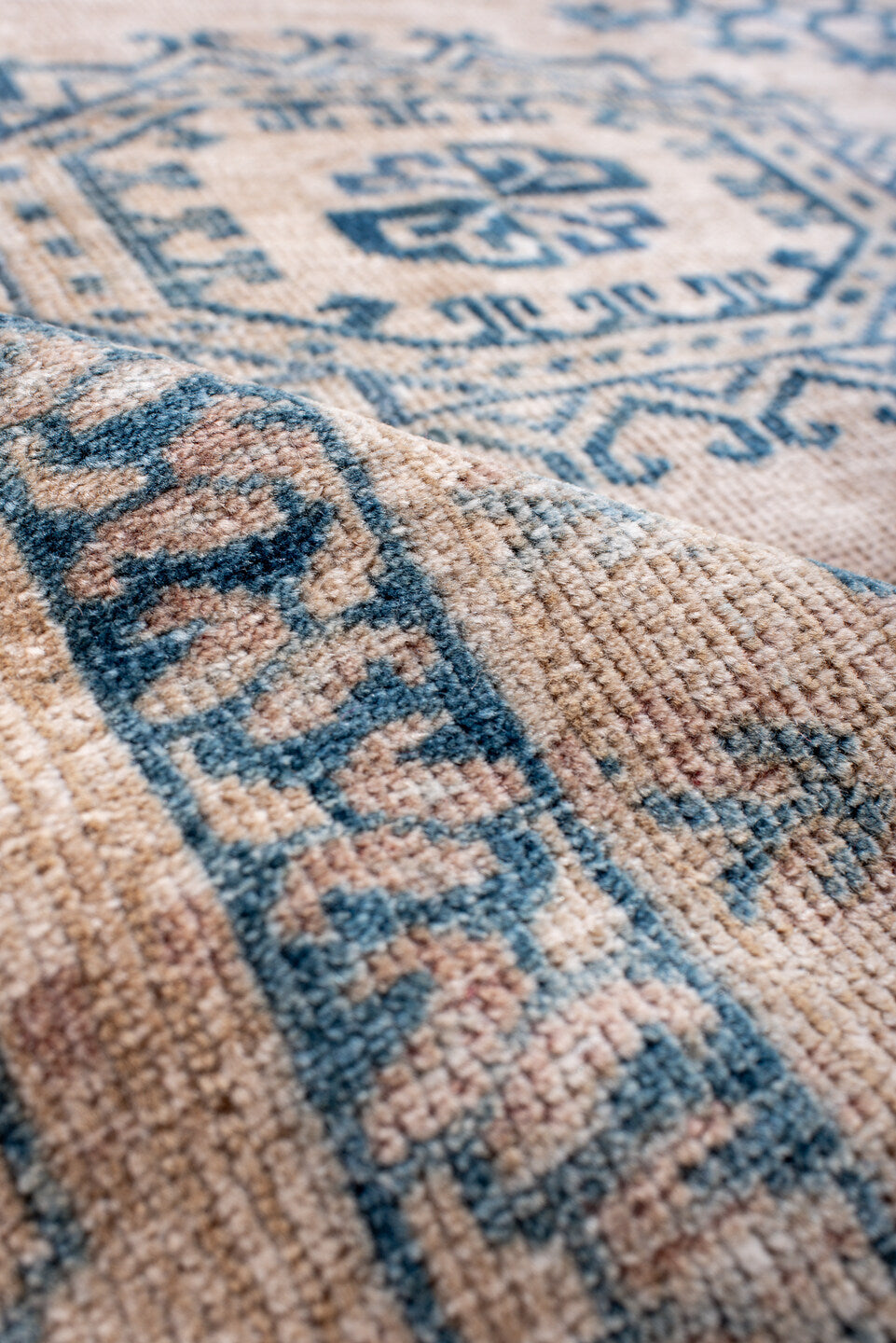 7' x 10' one-of-a-kind handmade vintage Afghan large size rug. Color palette: blue, dark gray, fiord, gray, light blue