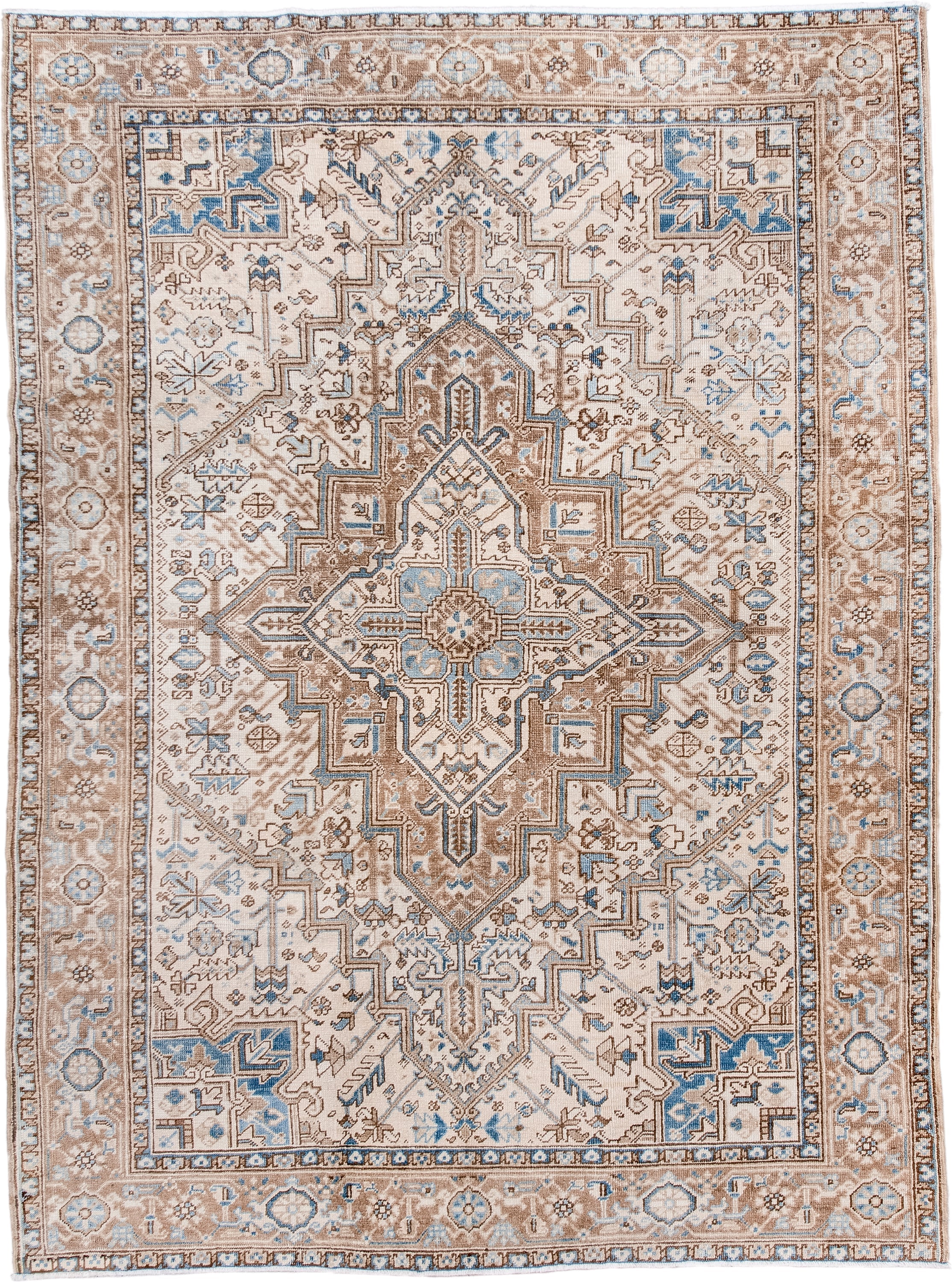 6' x 8' one-of-a-kind handmade antique Heriz medium size rug. Color palette: ivory, taupe, sky blue, camel, brown, beige