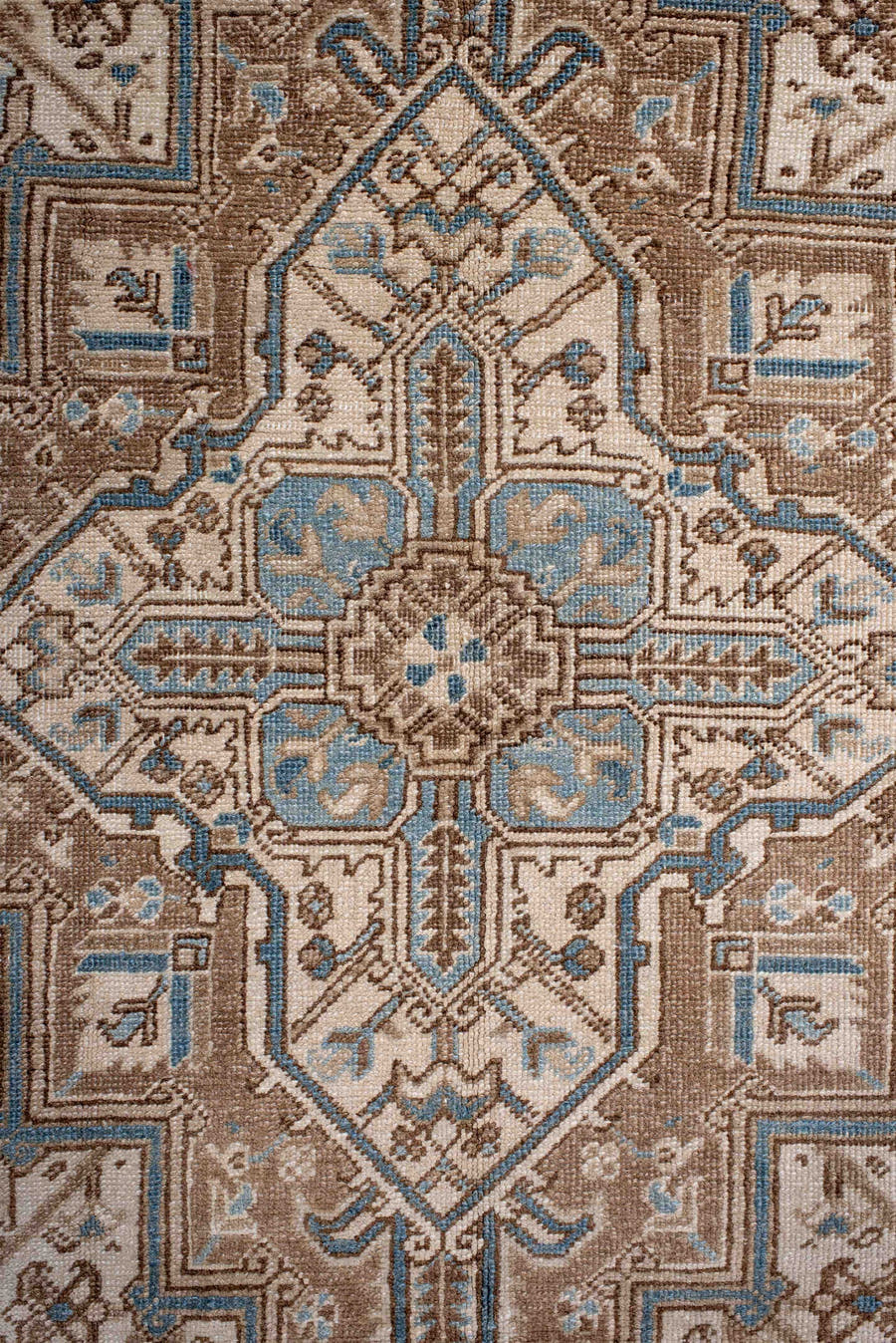 6' x 8' one-of-a-kind handmade antique Heriz medium size rug. Color palette: ivory, taupe, sky blue, camel, brown, beige