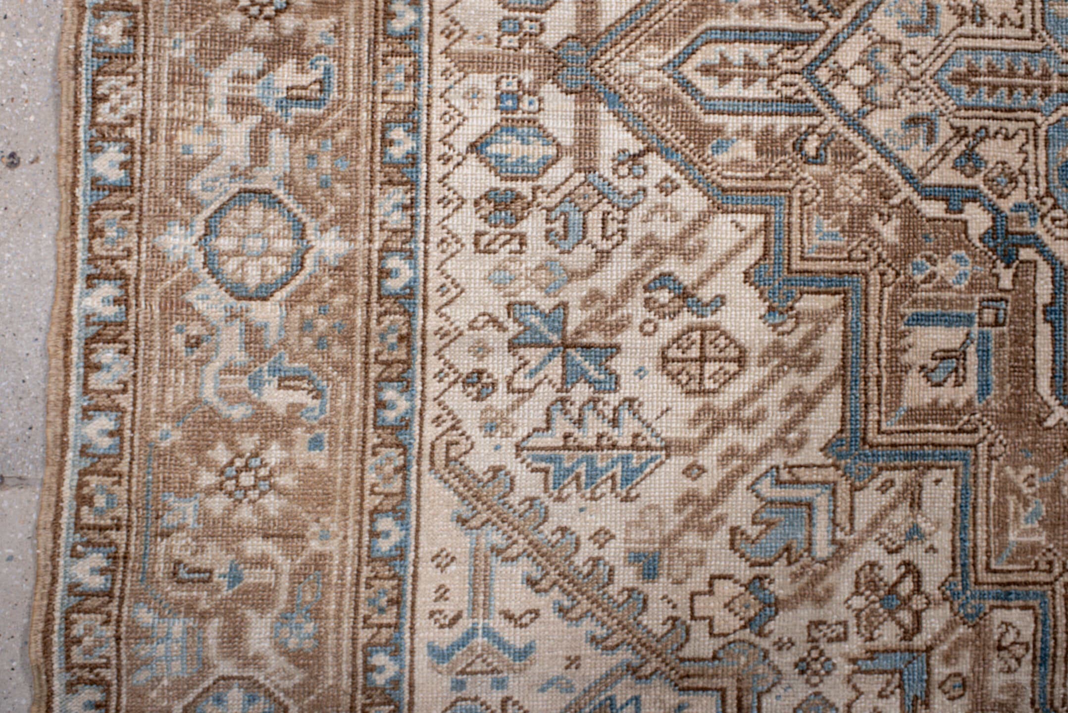 6' x 8' one-of-a-kind handmade antique Heriz medium size rug. Color palette: ivory, taupe, sky blue, camel, brown, beige