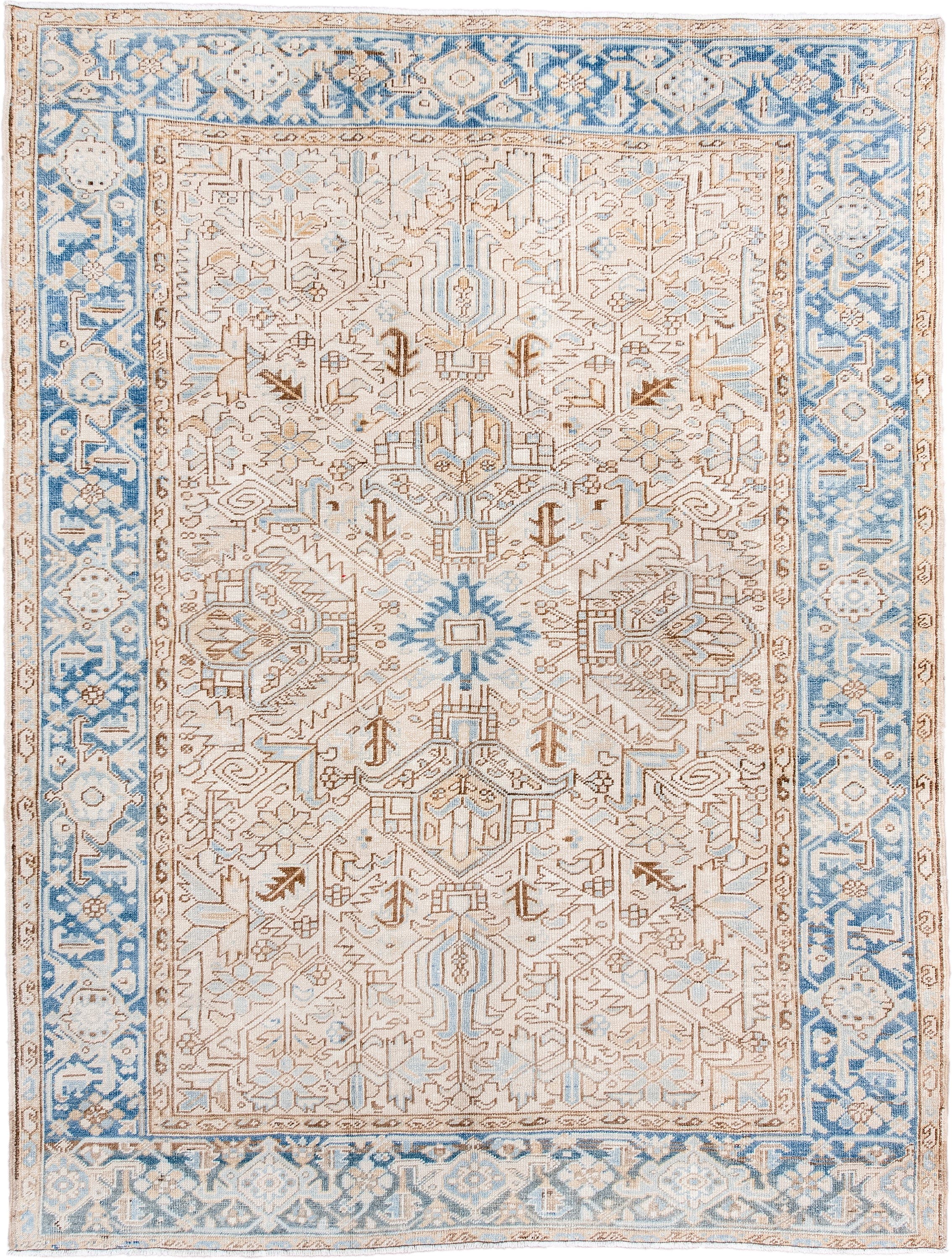 6' x 8' one-of-a-kind handmade antique Heriz medium size rug. Color palette: ivory, sky blue, camel, taupe, light brown