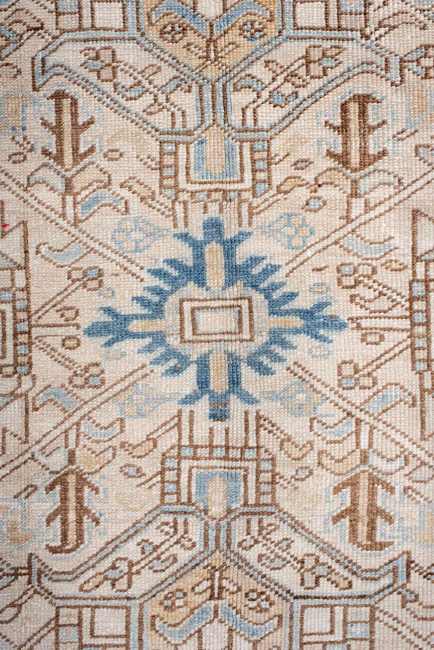 6' x 8' one-of-a-kind handmade antique Heriz medium size rug. Color palette: ivory, sky blue, camel, taupe, light brown