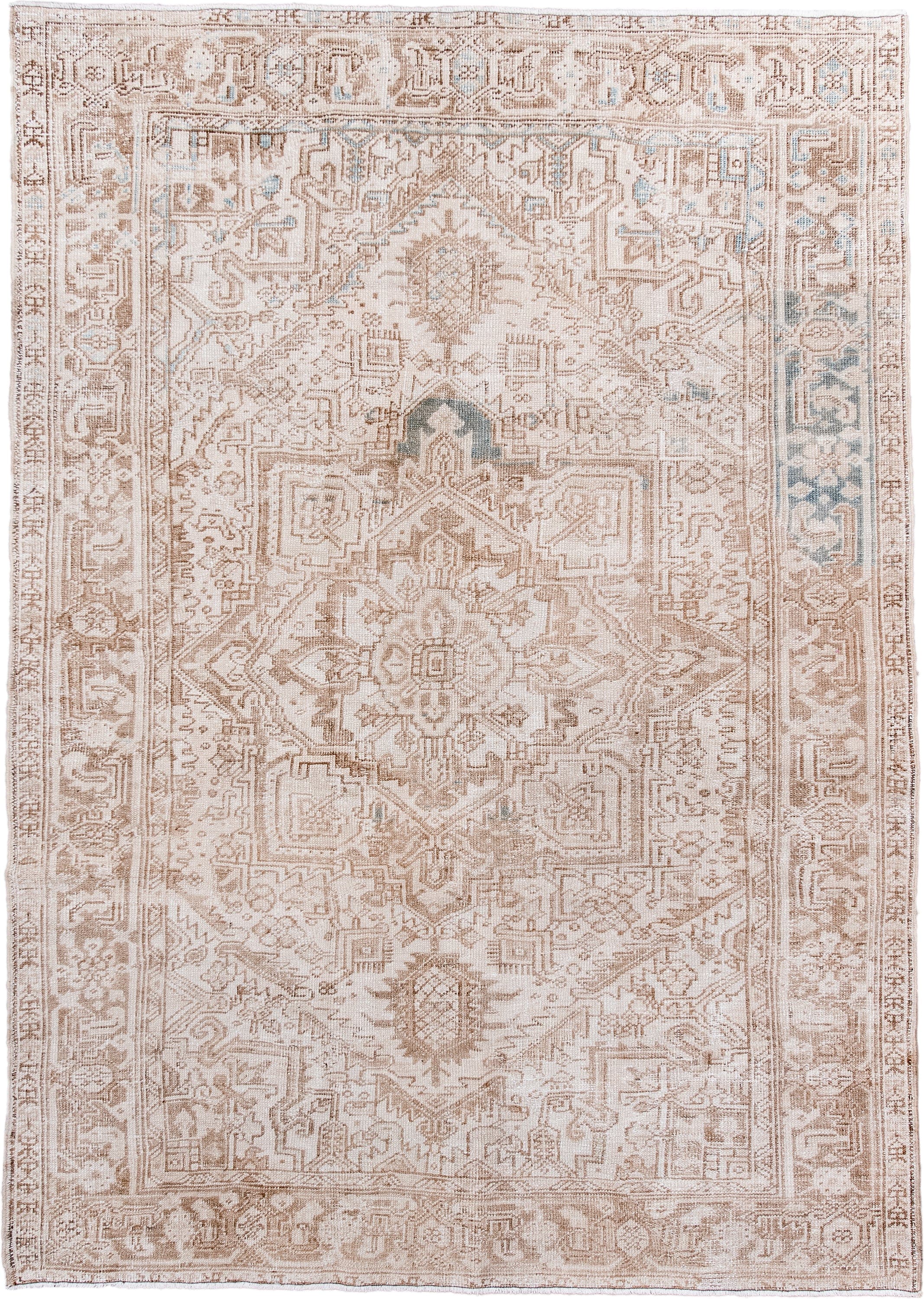 6' x 8' one-of-a-kind handmade antique Heriz medium size rug. Color palette: ivory, camel, taupe, beige, pale blue, sand