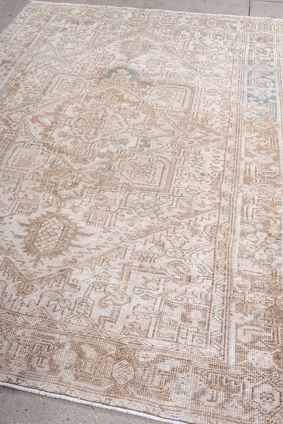 6' x 8' one-of-a-kind handmade antique Heriz medium size rug. Color palette: ivory, camel, taupe, beige, pale blue, sand