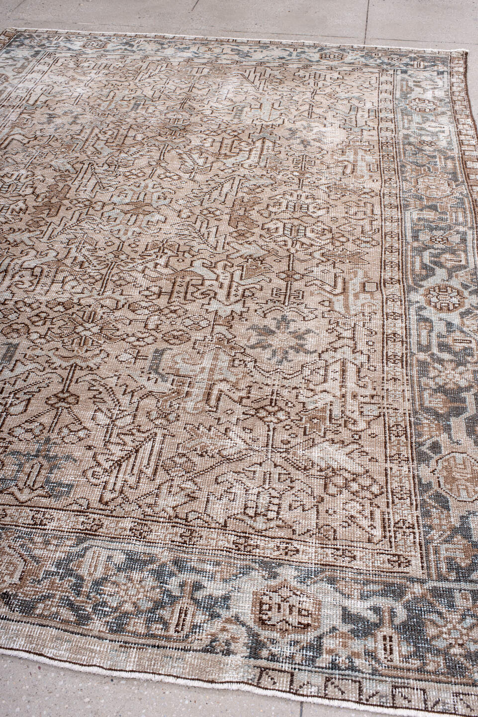 7' x 10' one-of-a-kind handmade antique Heriz large size rug. Color palette: ivory, taupe, charcoal, brown, beige, slate