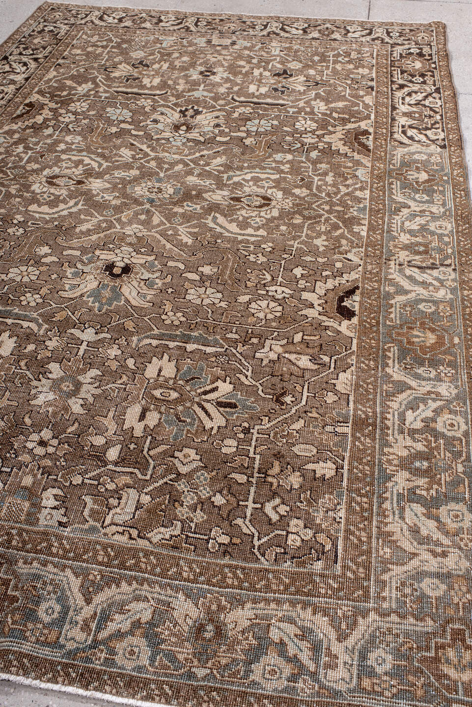 6' x 10' one-of-a-kind handmade antique Heriz large size rug. Color palette: taupe, brown, ivory, slate, beige, charcoal