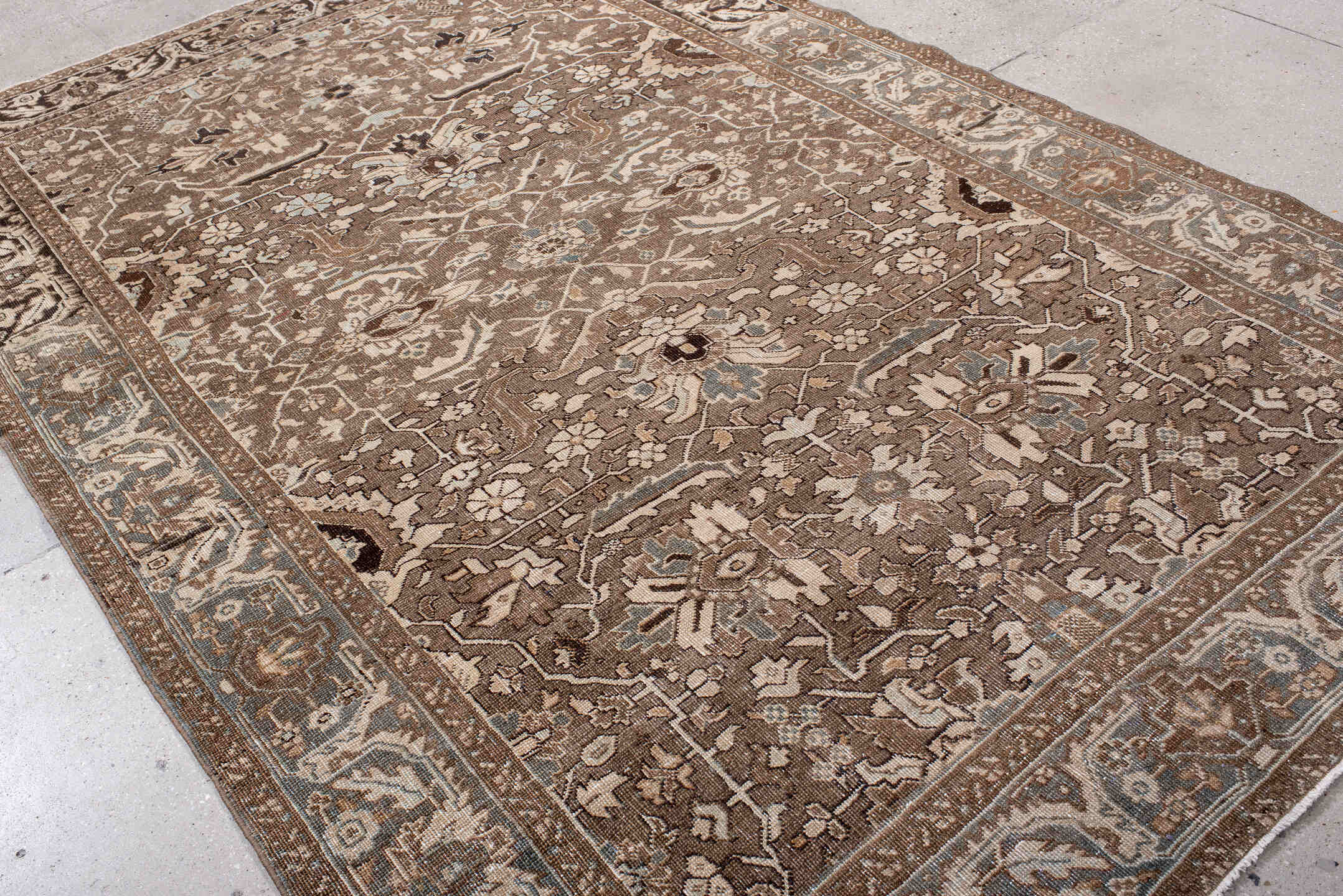6' x 10' one-of-a-kind handmade antique Heriz large size rug. Color palette: taupe, brown, ivory, slate, beige, charcoal