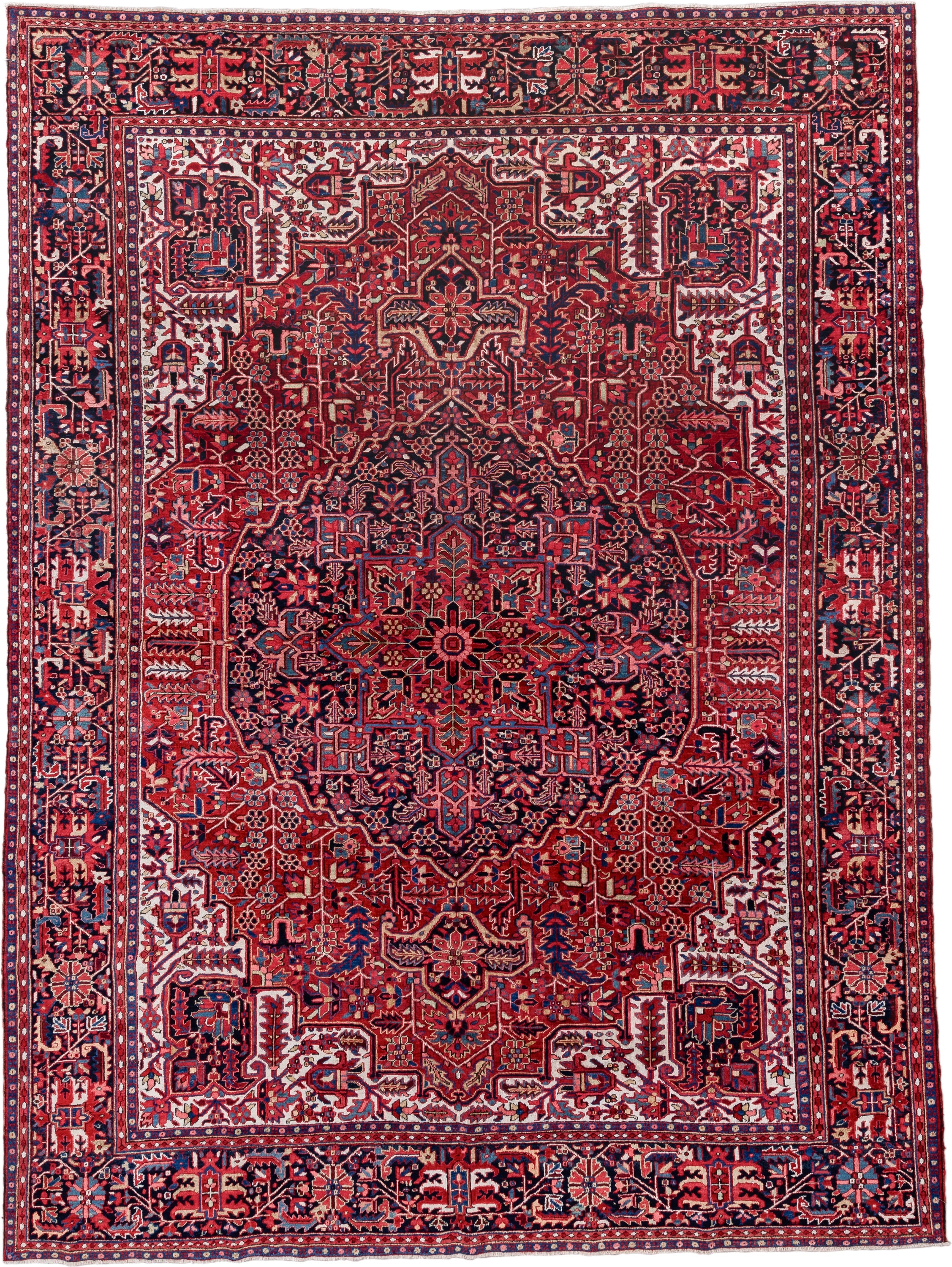 9' x 13' one-of-a-kind handmade vintage Heriz large size rug. Color palette: red, navy, ivory, rust, rose, sky blue