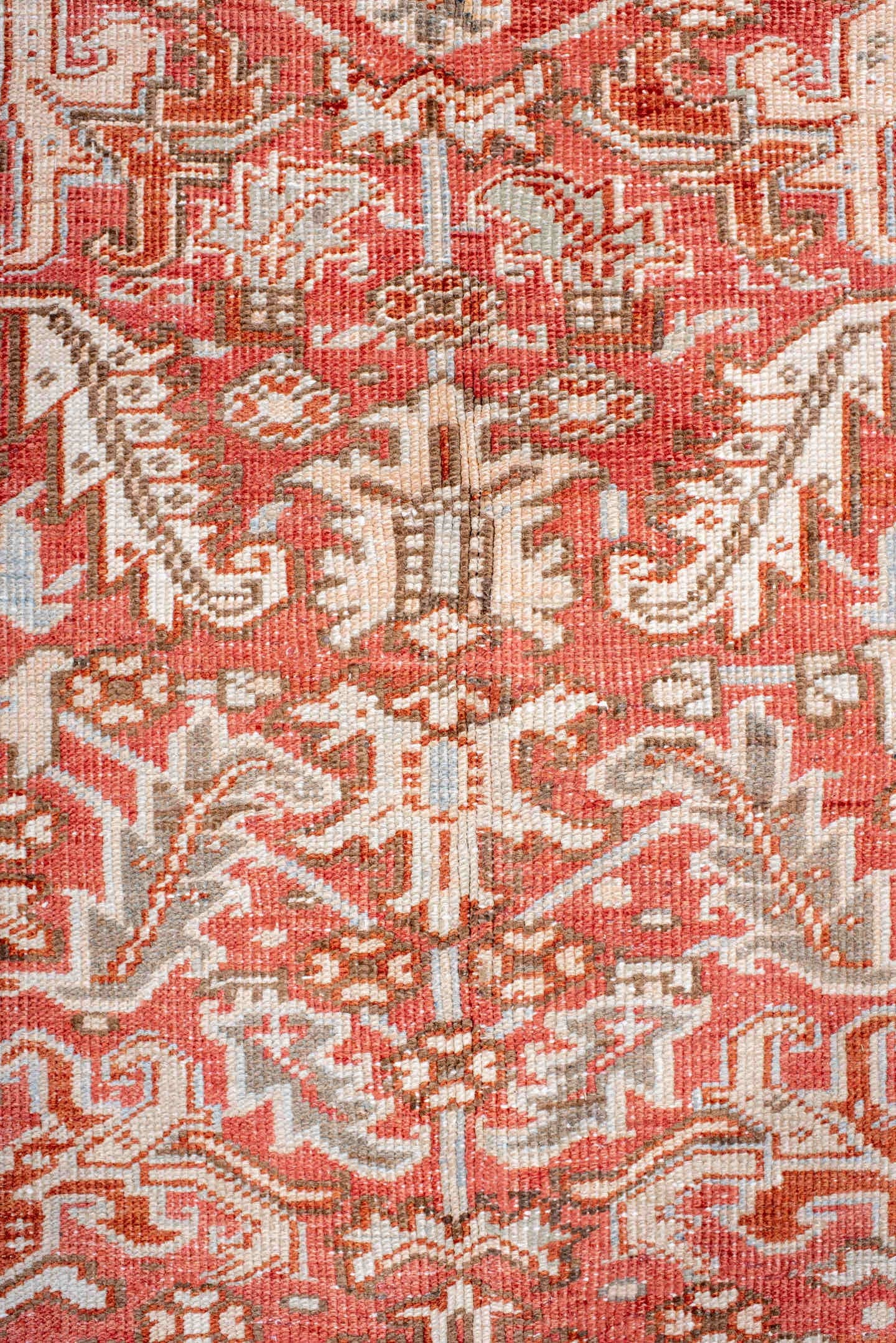 5' x 7' one-of-a-kind handmade vintage Heriz rug. Color palette: coral, ivory, taupe, terra cotta, camel, sage, terracotta