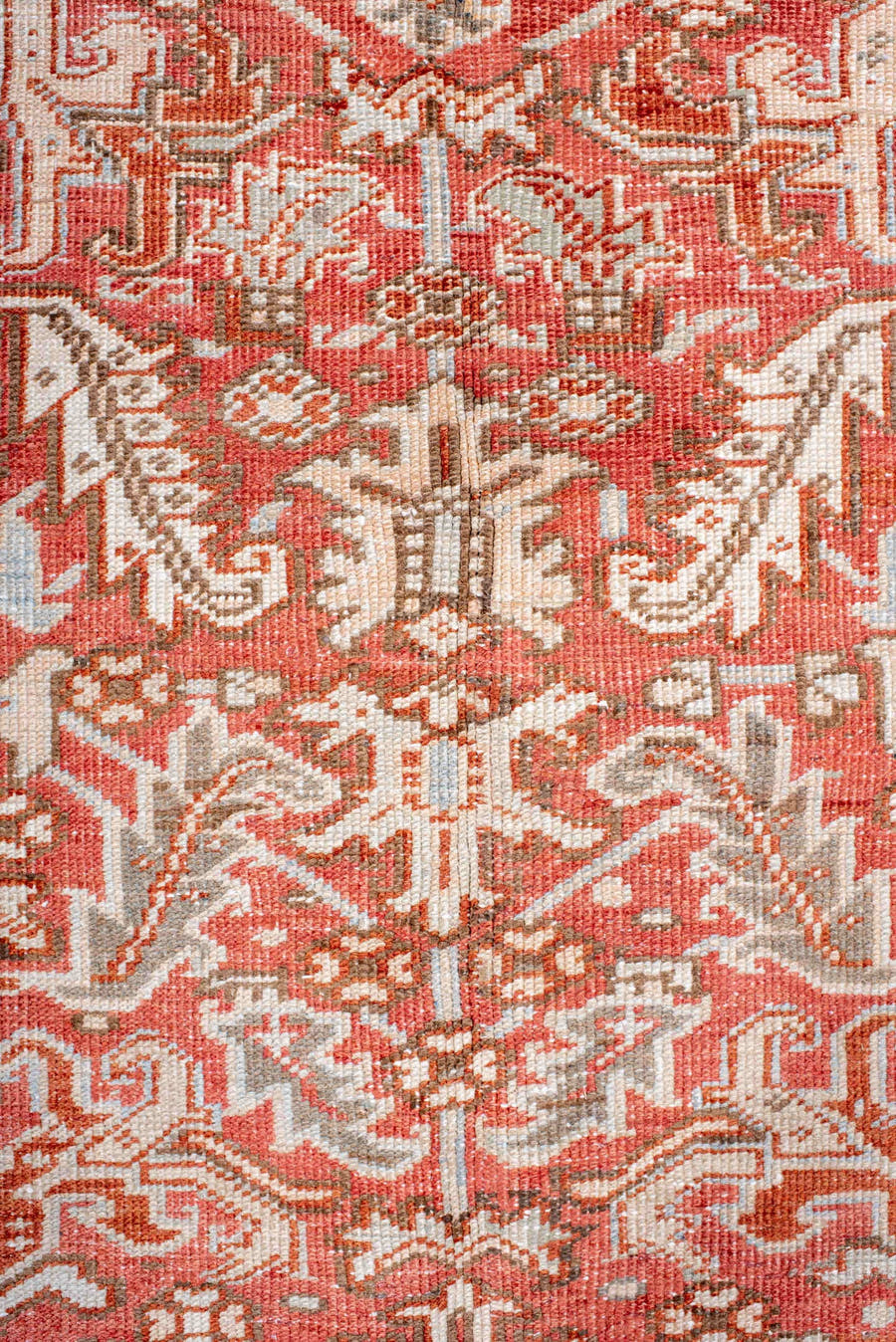 5' x 7' one-of-a-kind handmade vintage Heriz rug. Color palette: coral, ivory, taupe, terra cotta, camel, sage, terracotta