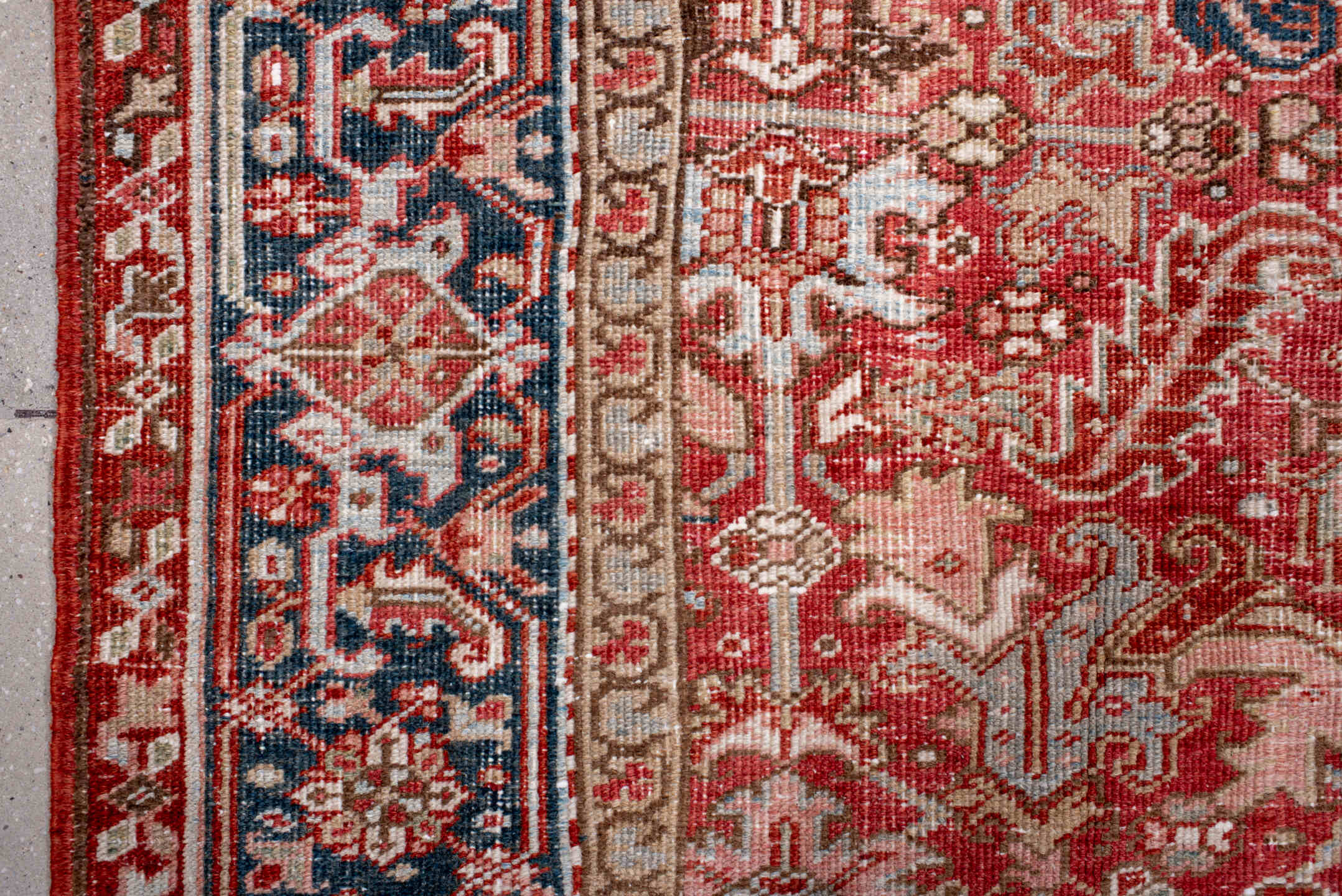 6' x 8' one-of-a-kind handmade antique Heriz medium size rug. Color palette: terra cotta, ivory, navy, soft blue, rust