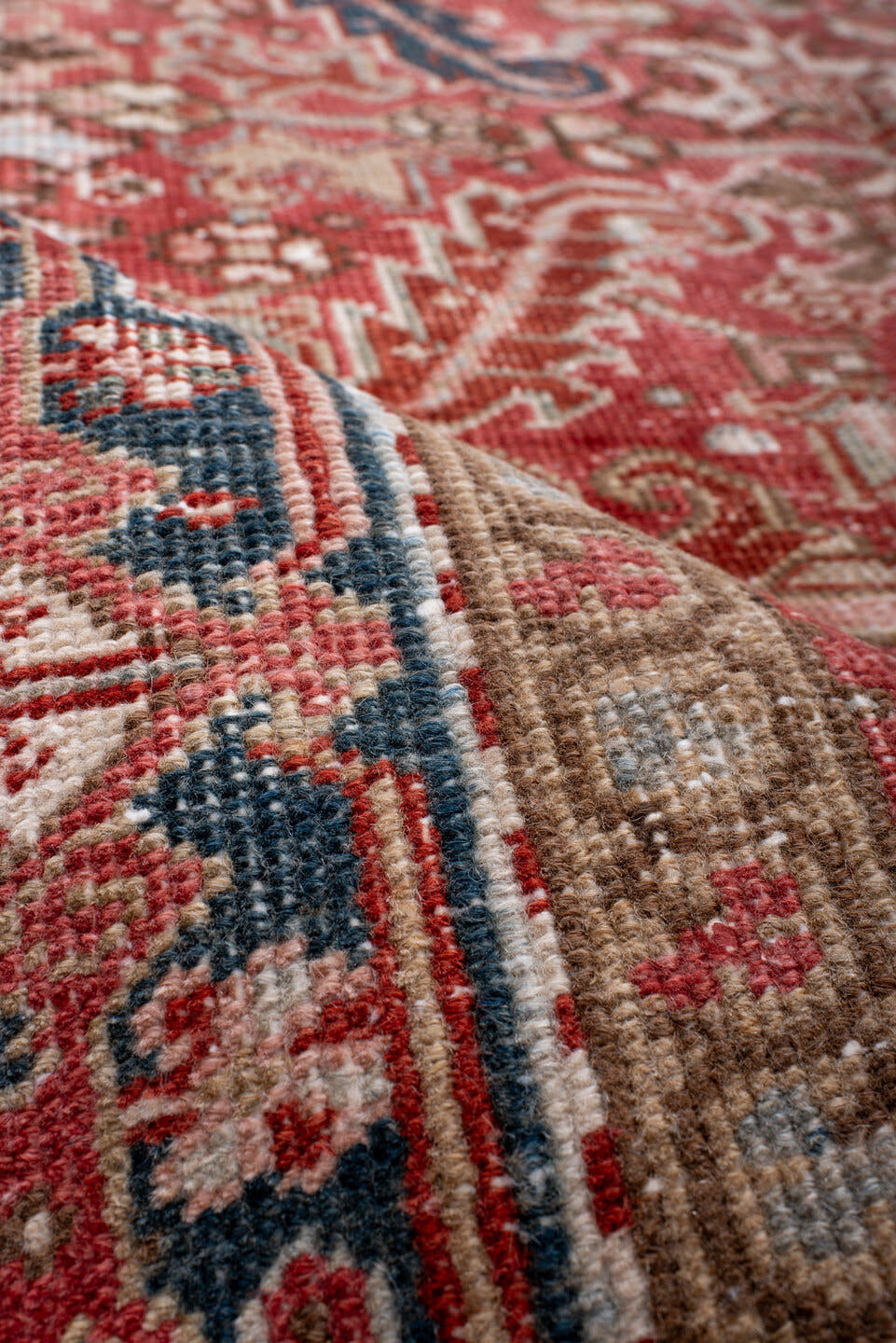 6' x 8' one-of-a-kind handmade antique Heriz medium size rug. Color palette: terra cotta, ivory, navy, soft blue, rust