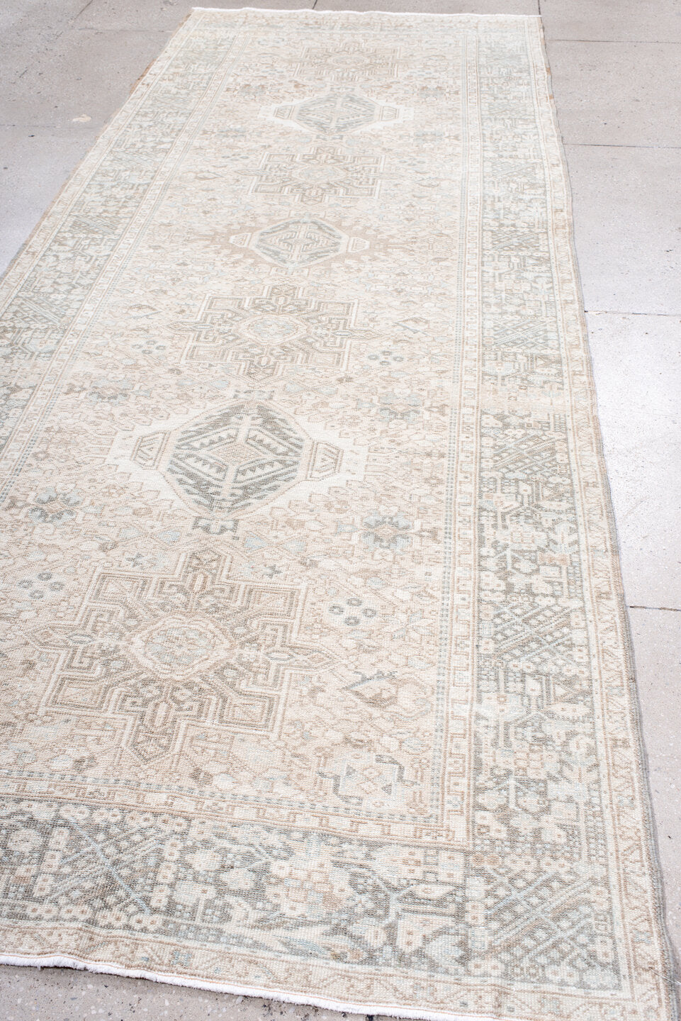 4' x 12' one-of-a-kind handmade antique Karaje runner rug. Color palette: ivory, taupe, pale blue, beige, camel, soft gray