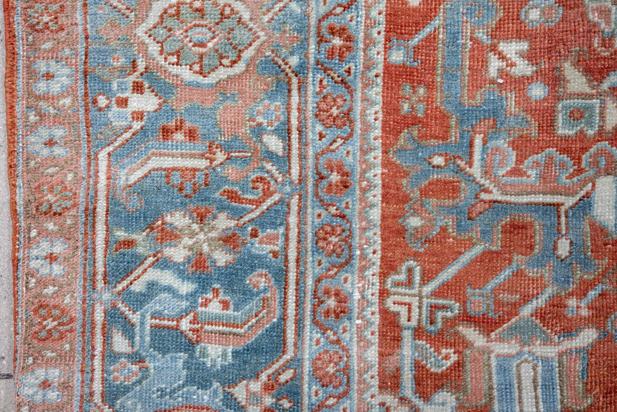 7' x 11' one-of-a-kind handmade vintage Heriz large size rug. Color palette: terra cotta, powder blue, ivory, rust, sky blue