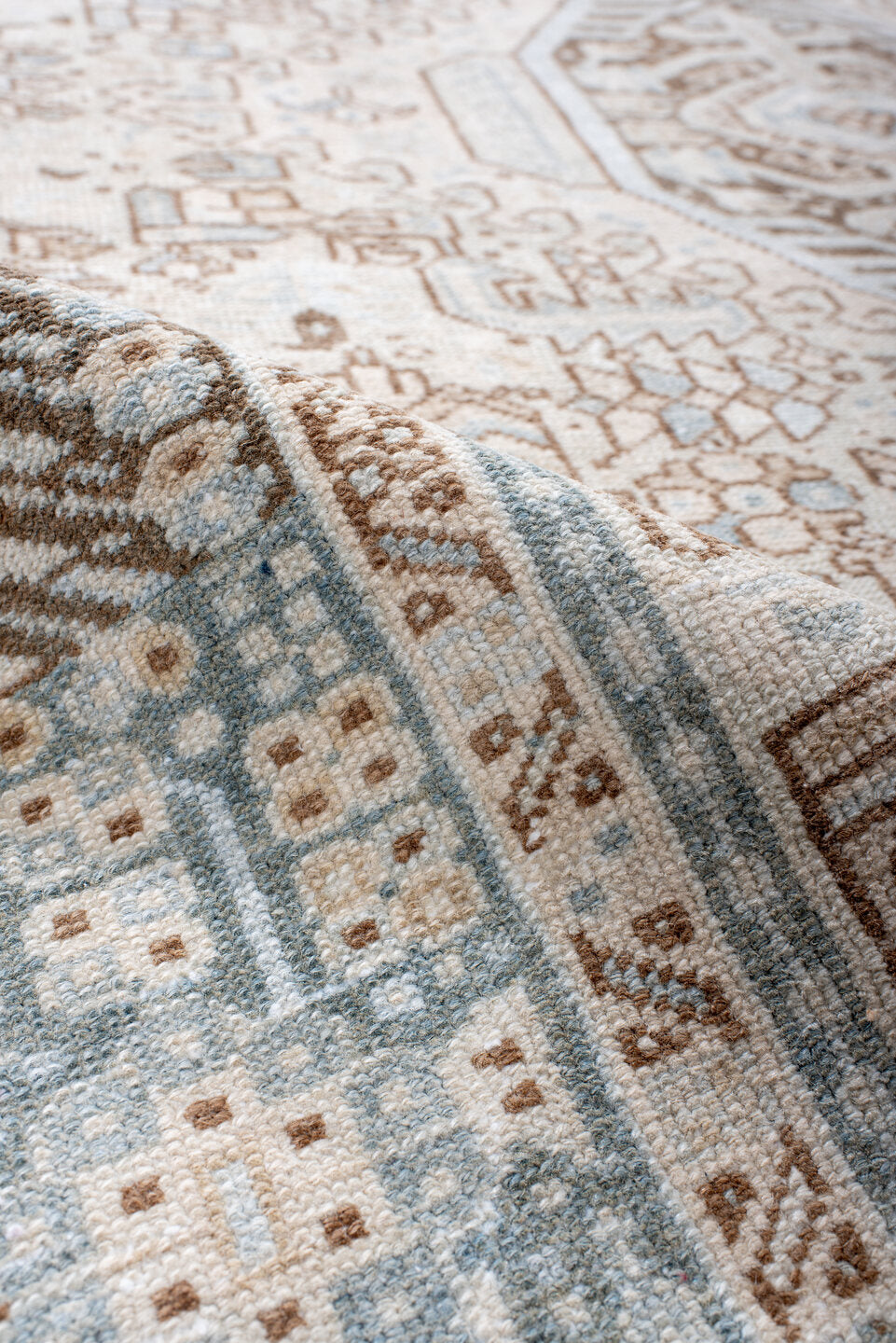 5' x 12' one-of-a-kind handmade antique Karaje runner rug. Color palette: ivory, pale blue, taupe, camel, light brown