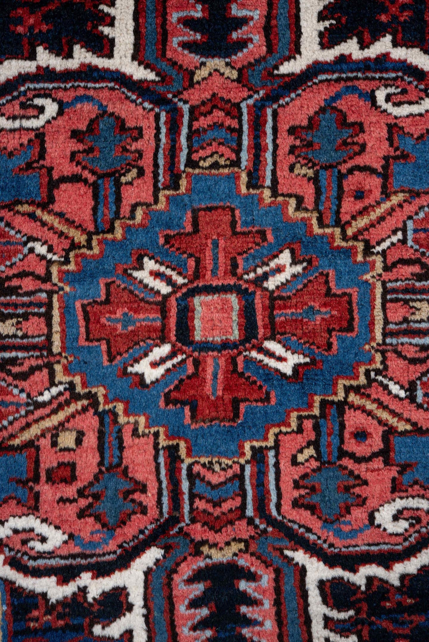 7' x 10' one-of-a-kind handmade vintage Heriz large size rug. Color palette: rust, navy, ivory, crimson, cobalt, camel, rose