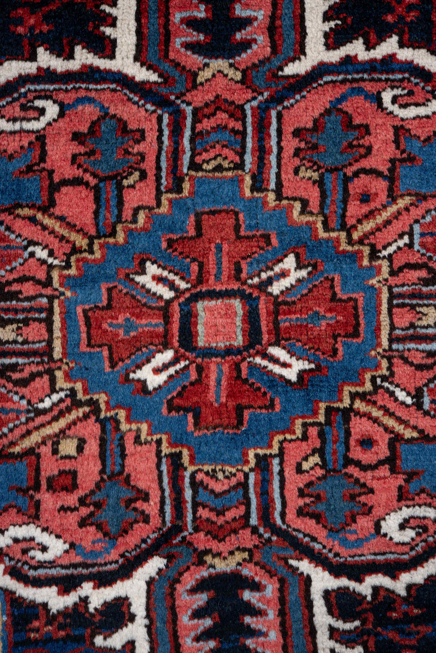 7' x 10' one-of-a-kind handmade vintage Heriz large size rug. Color palette: rust, navy, ivory, crimson, cobalt, camel, rose