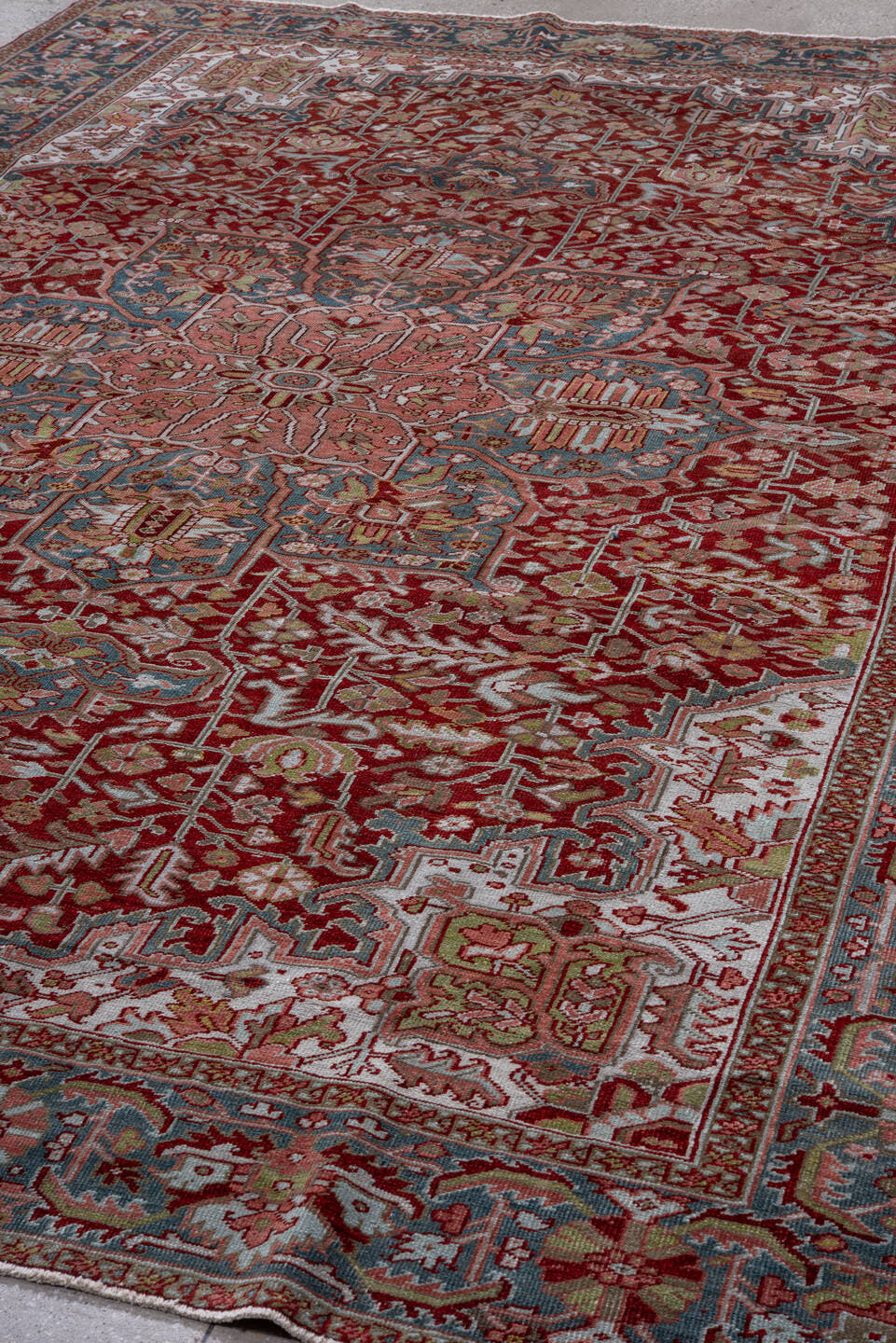 8' x 12' one-of-a-kind handmade vintage Heriz large size rug. Color palette: rust, powder blue, ivory, rose, navy, sage