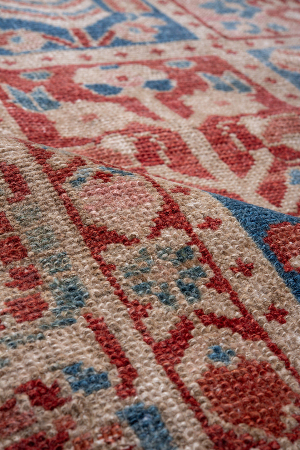 7' x 9' one-of-a-kind handmade vintage Baktiary rug. Color palette: ivory, coral, brick red, sky blue, dusty rose