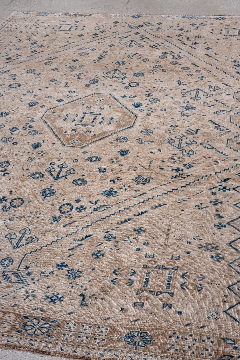 7' x 10' one-of-a-kind handmade vintage Shiraz large size rug. Color palette: ivory, blue, beige, camel, taupe, gray