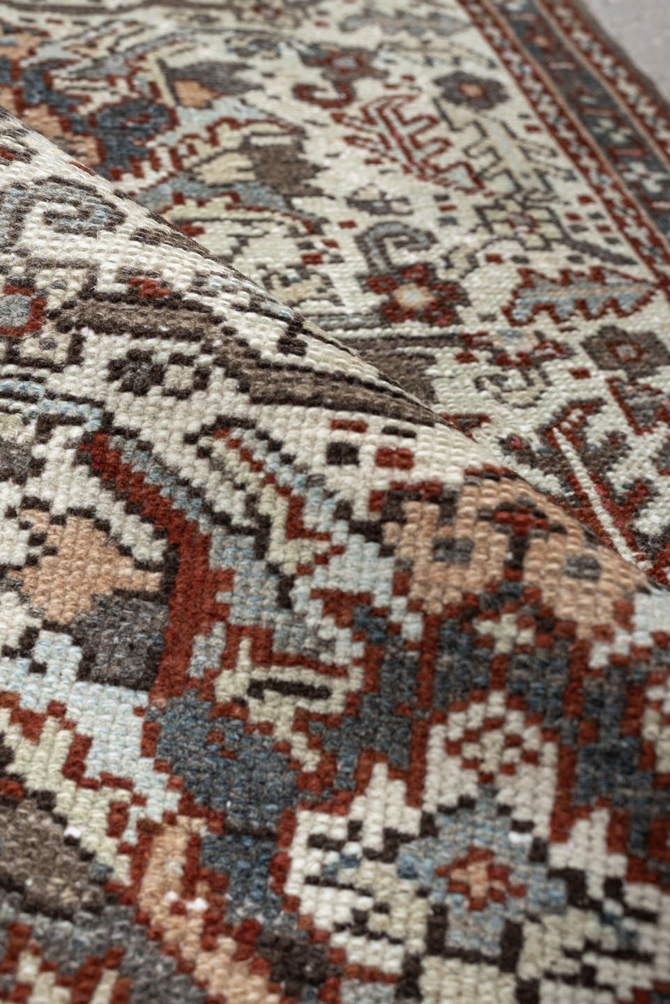 2' x 3' one-of-a-kind handmade antique Karaje small size rug. Color palette: ivory, rust, slate blue, taupe, deep brown
