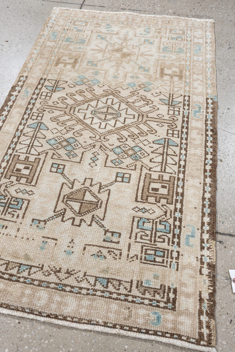 2' x 4' one-of-a-kind handmade antique Karaje small size rug. Color palette: ivory, sand, light aqua, taupe, brown, beige